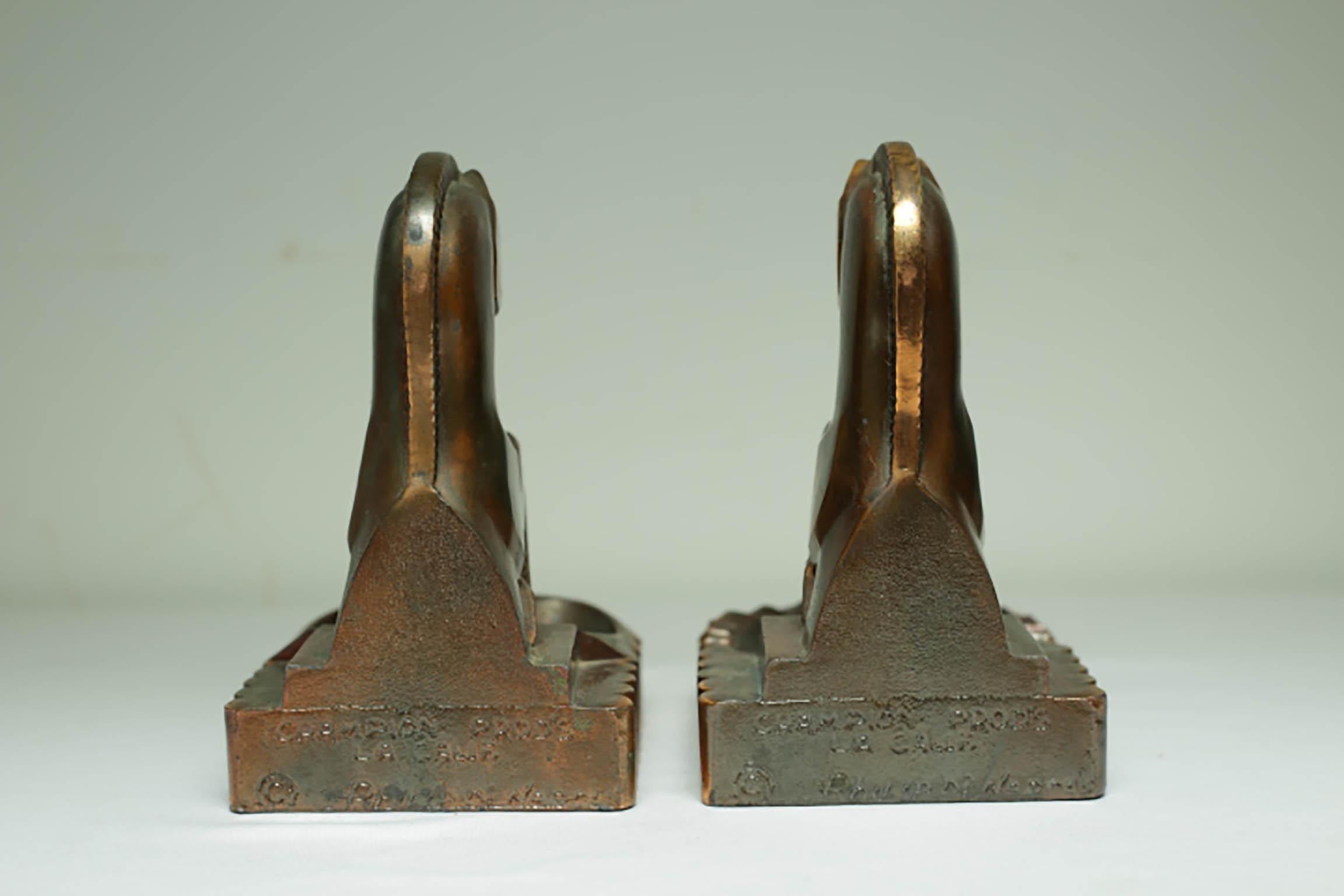 ABOUT

This is an original pair of Art Deco style cast gray or 