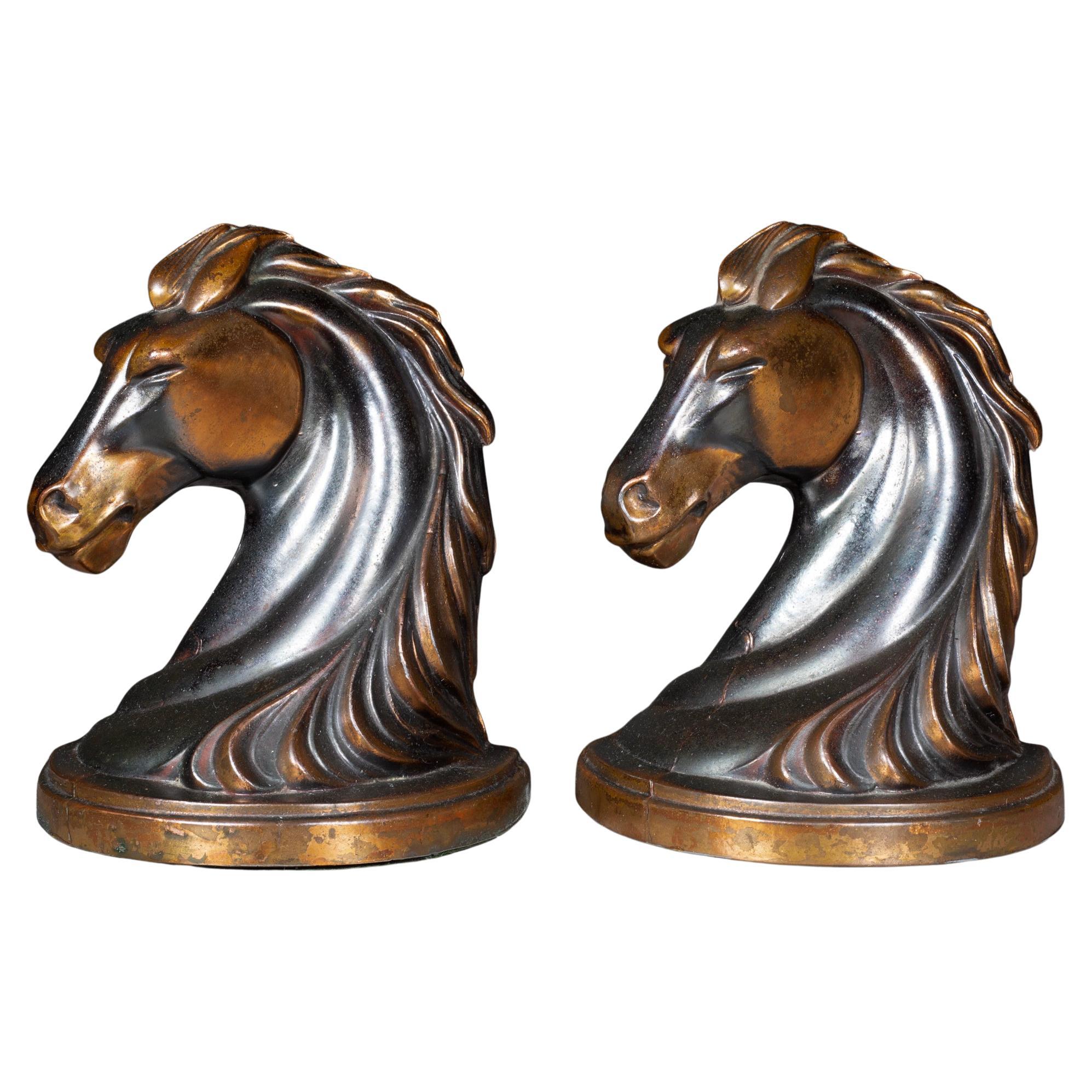 Reggilibri Art Deco con testa di cavallo placcata in bronzo, 1930 ca.