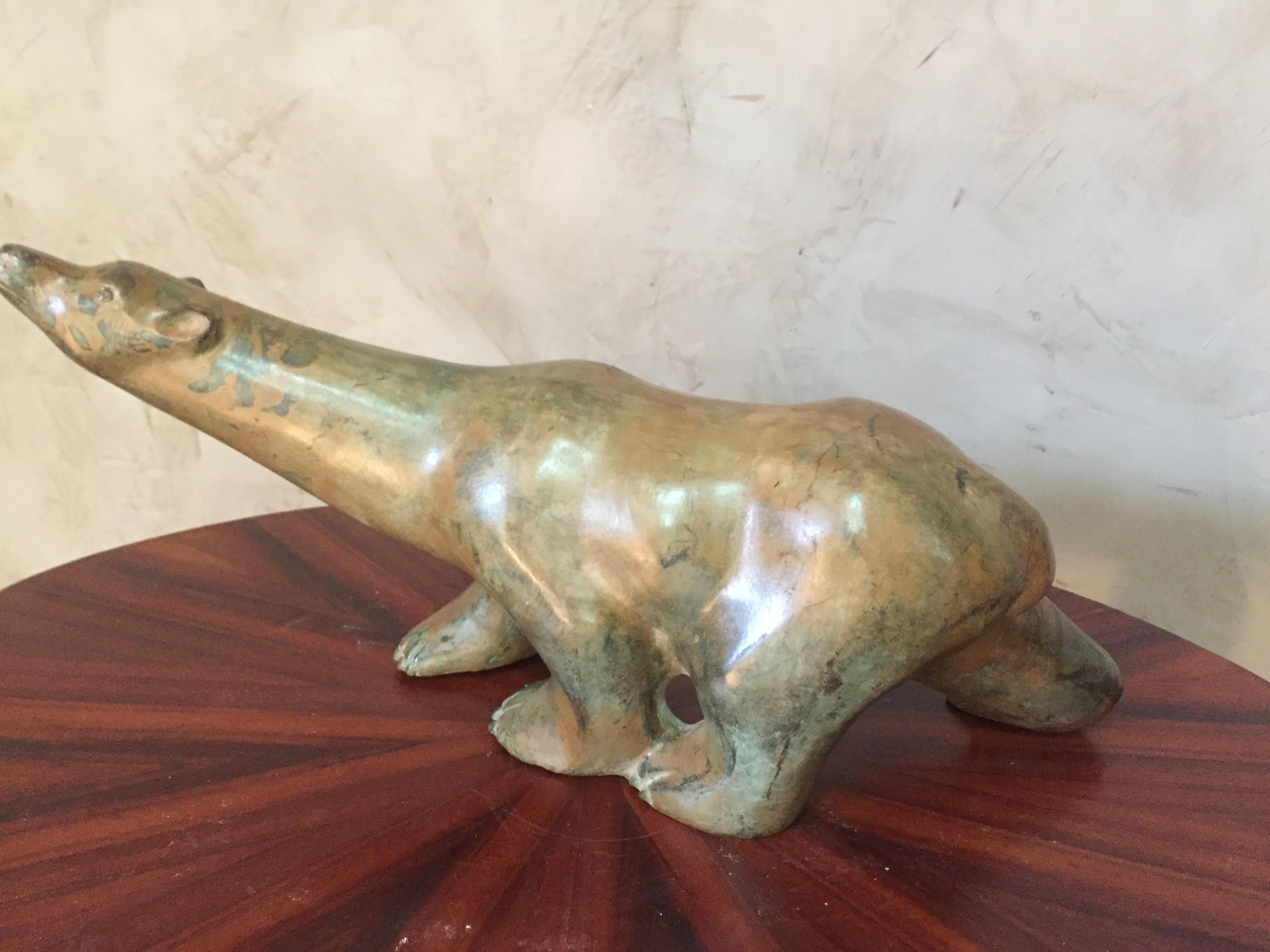 Exceptional bronze polar bear signed Pierre Chenet, French Bronzier.
Beautiful brown and green patina.