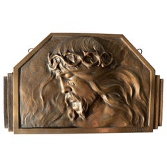 Plaque murale d'art religieux en bronze Art Déco en relief représentant la souffrance du Christ