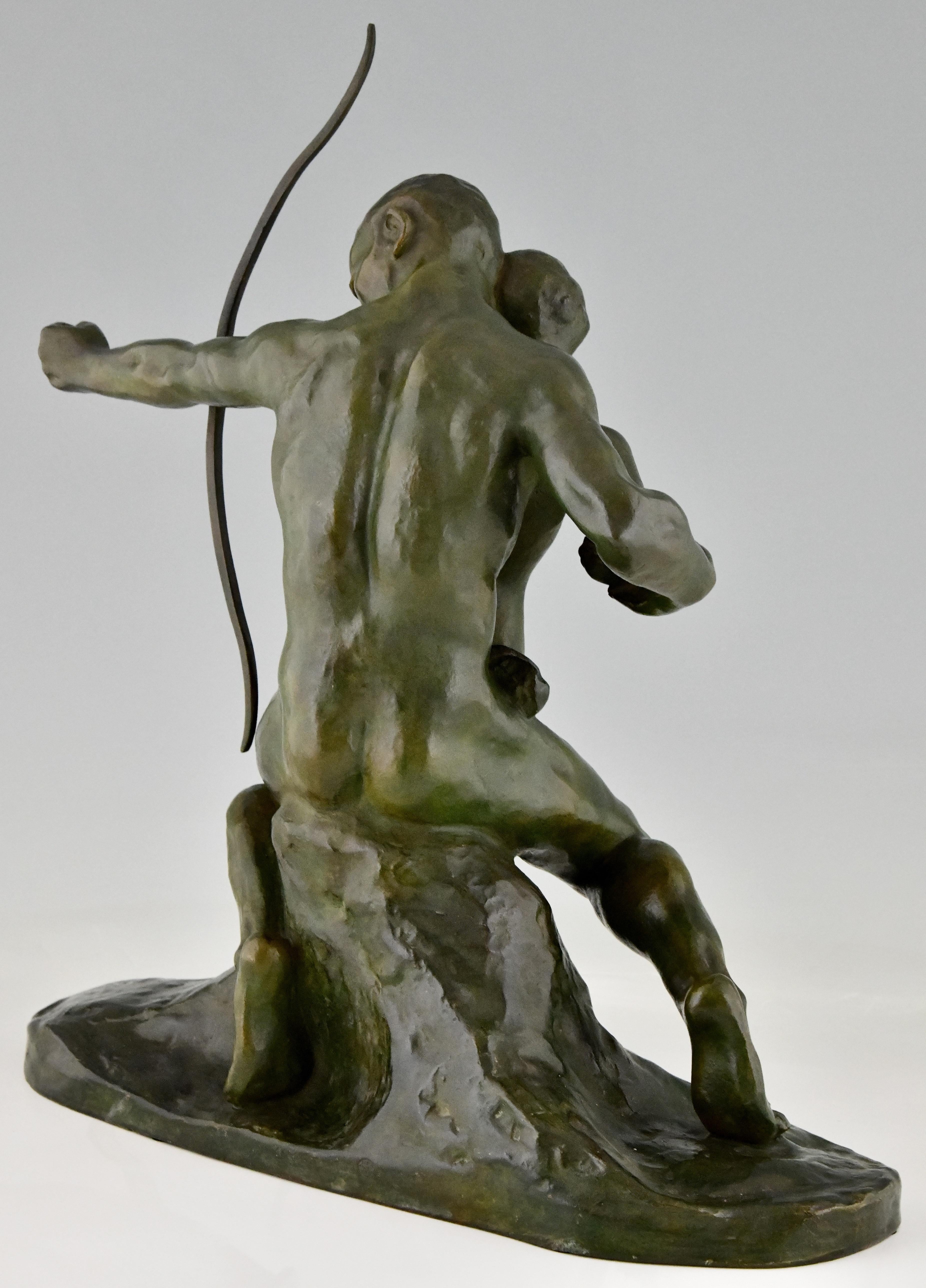Patinated Art Deco Bronze Sculpture Archer Learning a Boy to Use a Bow by Gennarelli 1930 For Sale