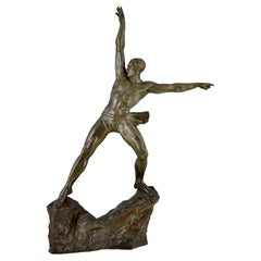 Art Deco bronze sculpture athlete on a rock by Pierre Le Faguays France 1934.
