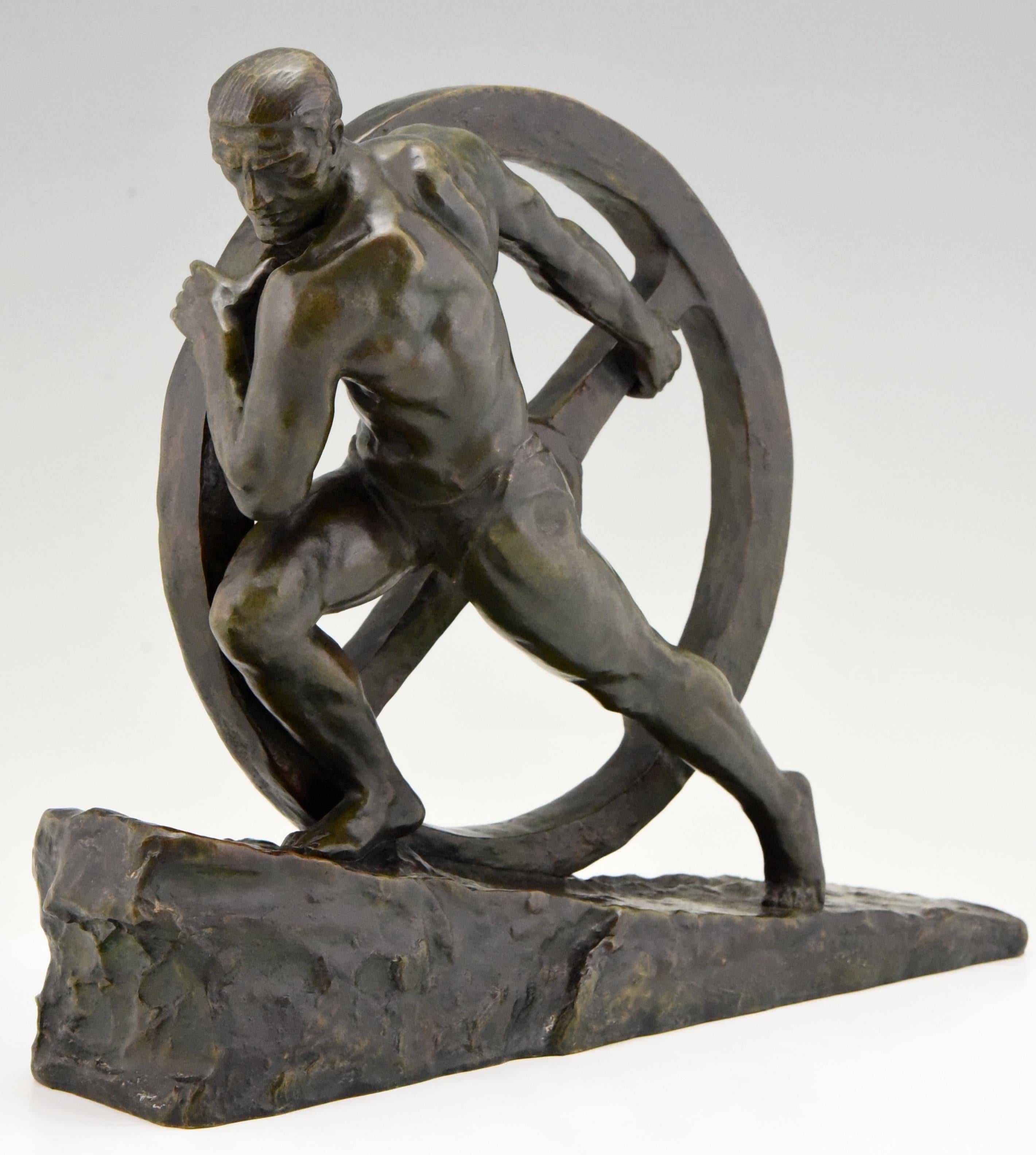 French Art Deco Bronze Sculpture Athlete Pushing a Wheel Strength Pierre Le Faguays