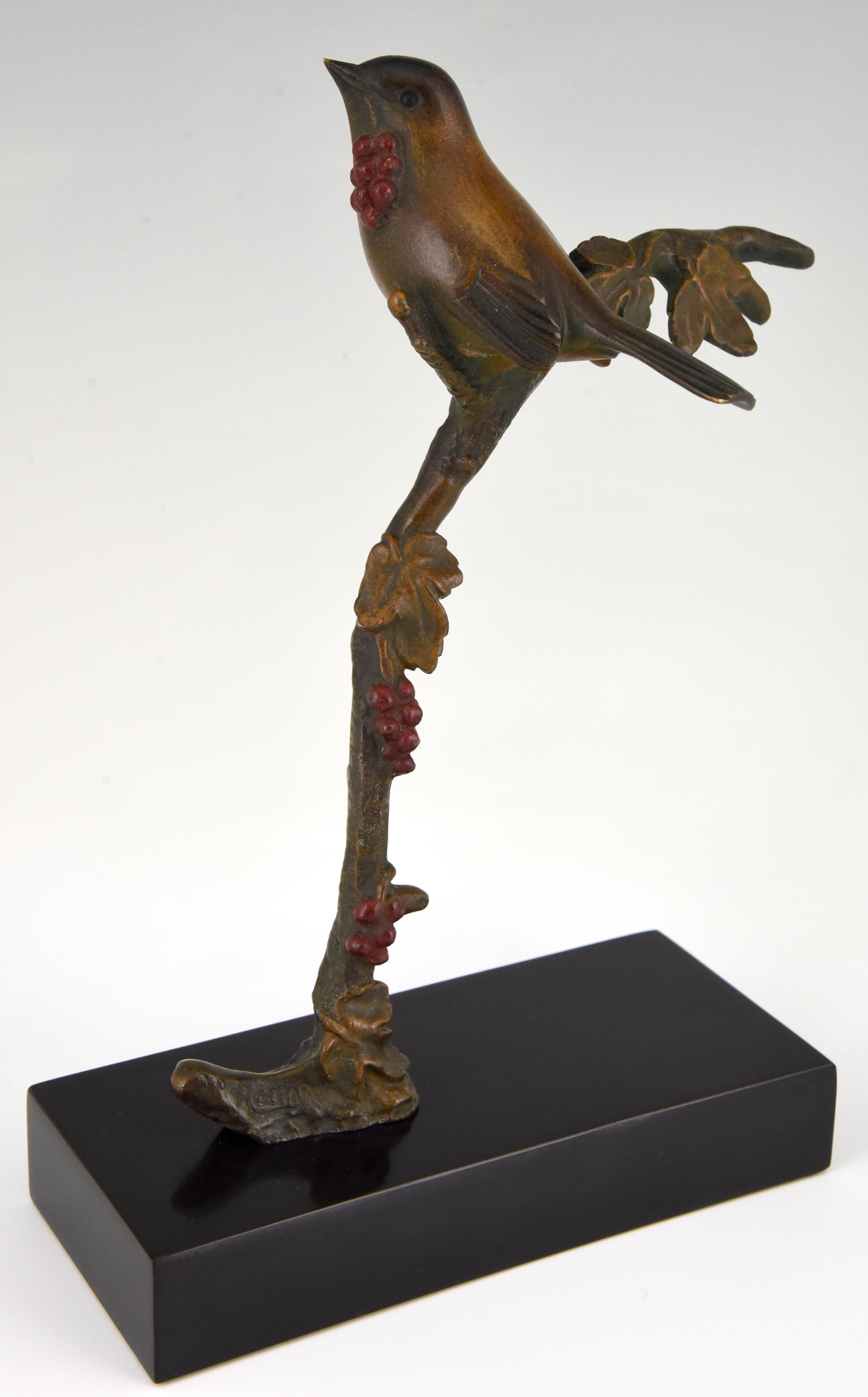 Lovely bronze sculpture of a bird on a branch with berries signed by the French artist Irénée Rochard. The sculpture has a beautiful multi-color patina and stands on a Belgian black marble base. France, 1930.
Literature:
“Animals in bronze” by