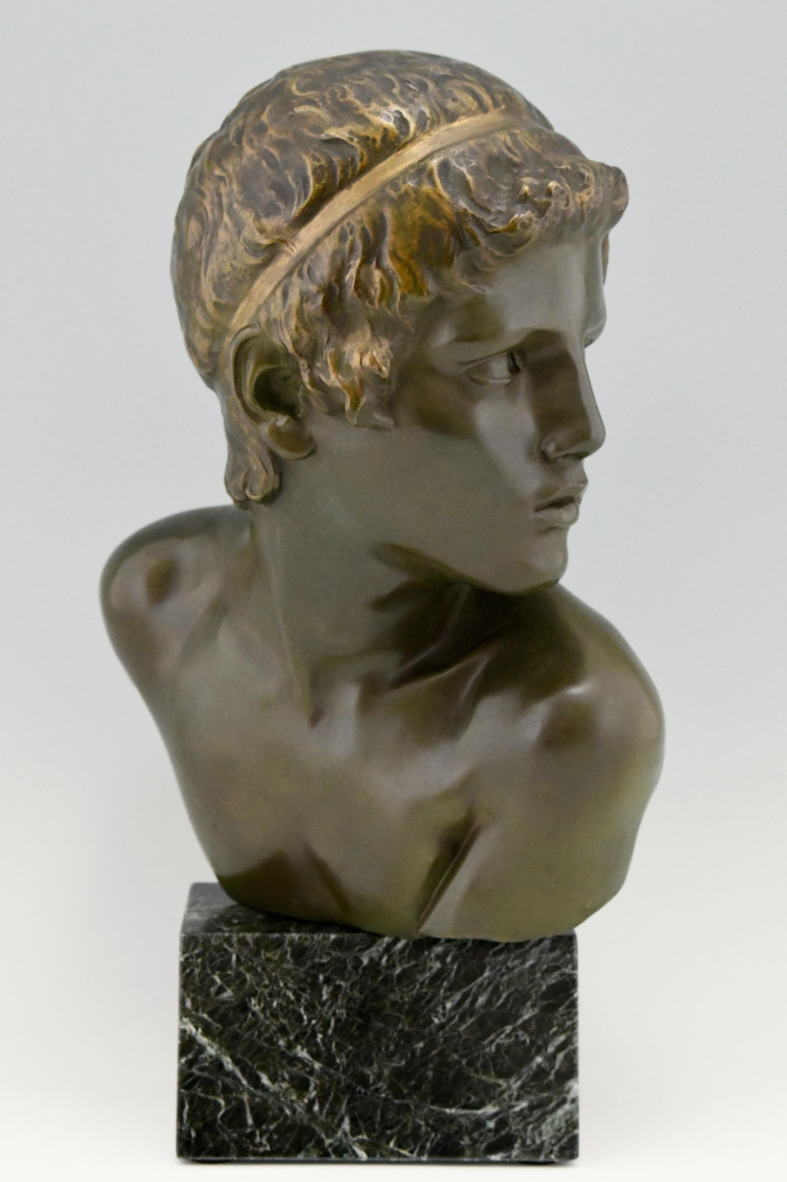 Art Deco bronze sculpture of Achilles as a child. The bronze bust is signed by Constant Roux (1865-1929) with foundry seal Les Neveux de Lehmann and is numbered. The sculpture stands on a green marble base and can be turned, France, 1920. 
