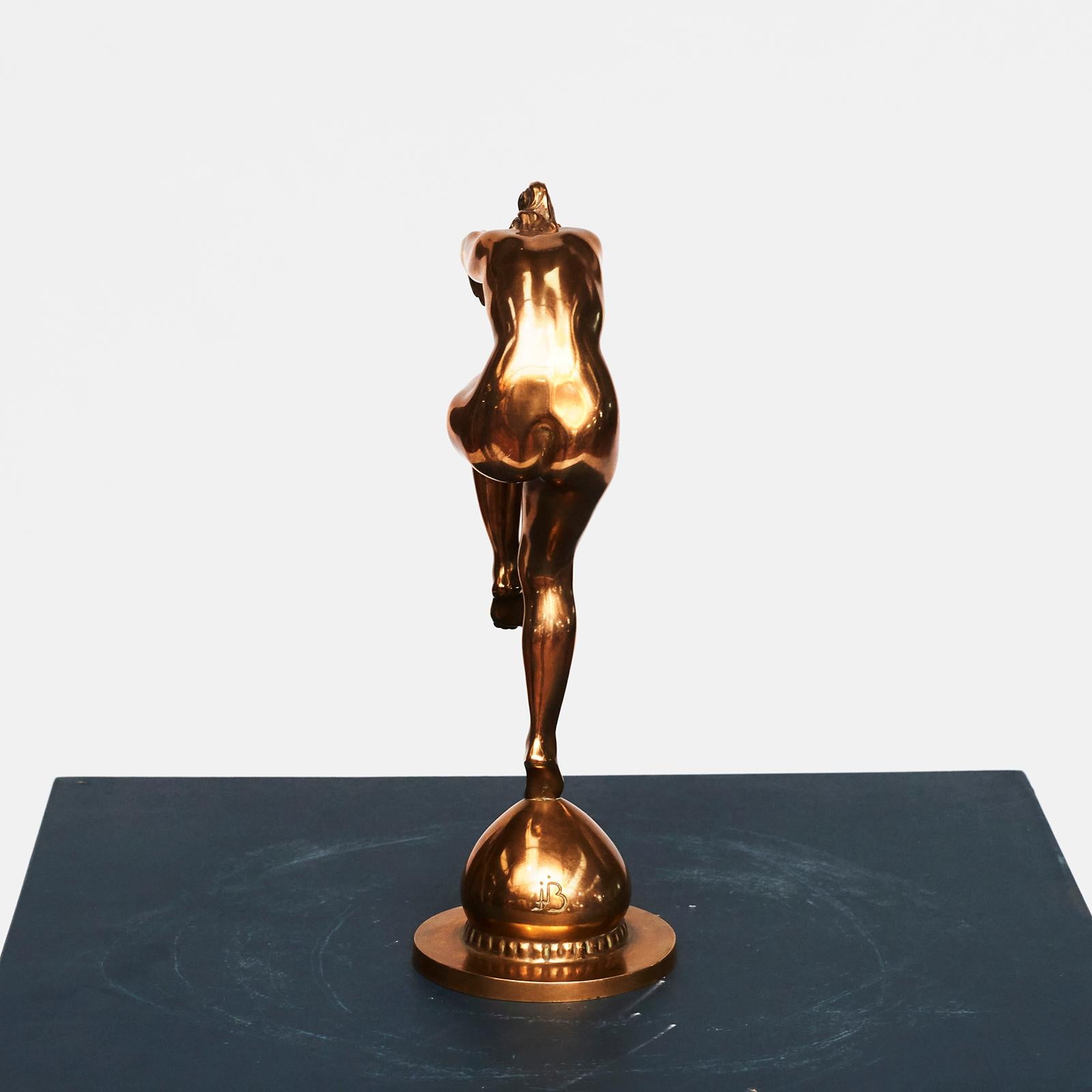 A polished bronze sculpture of a dancing nude women by Jens Jakob Bregnø, circa 1930s
Signed J.B.

Jens Jakob Bregnø, Danish, 1877-1946.
 