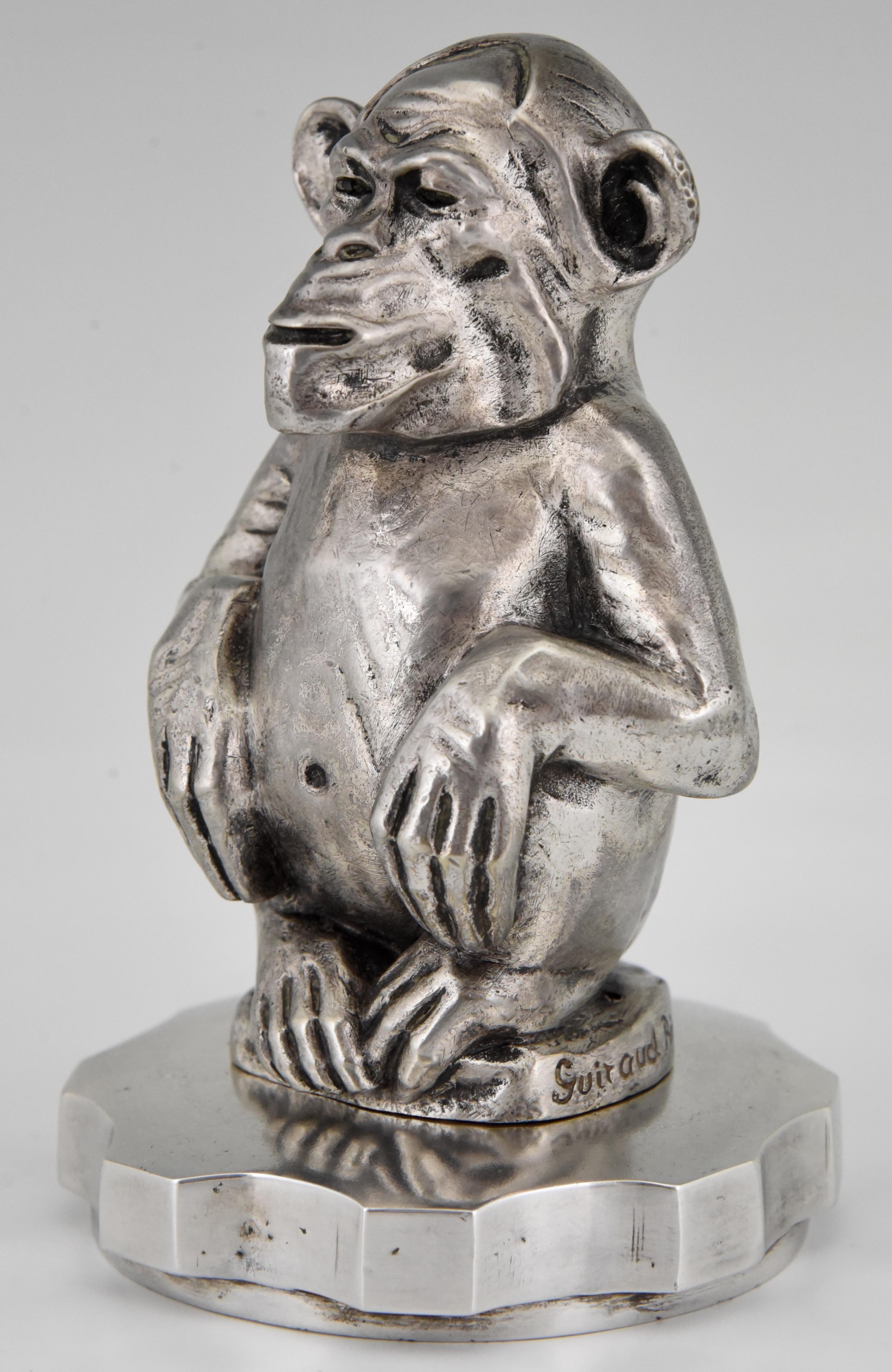 Art Deco bronze sculpture, car mascot sitting chimpanzee monkey.
The bronze has a silver patina and is fixed on a radiator cap.
Signed by the French artist Maurice Guiraud Rivière, circa 1920.

Literature:
This car mascot is illustrated in: