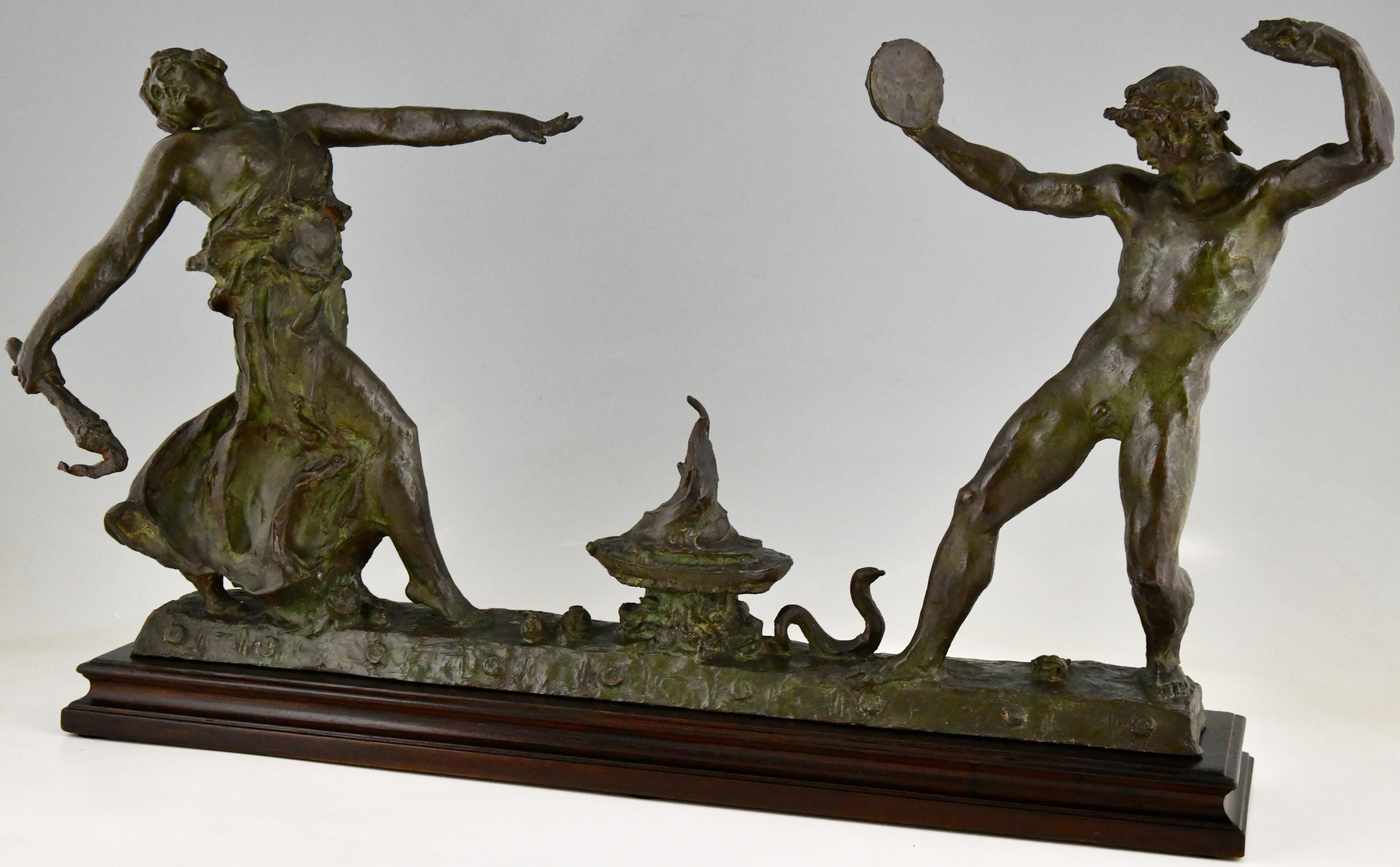 Art Deco bronze sculpture dance of fire, representing the dancers Anna Pavlova and Mikhail Mordkin, signed by Félix Benneteau-Degrois. 
With foundry mark Le Blanc Barbedienne, marked Cire perdue, lost wax technique. 
Bronze, with beautiful patina