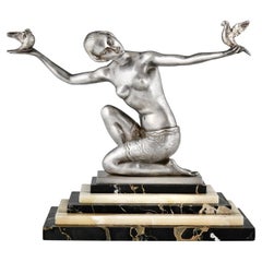 Escultura Art Decó de bronce bailarina con pájaros de Joan Salvado Voltas, 1930