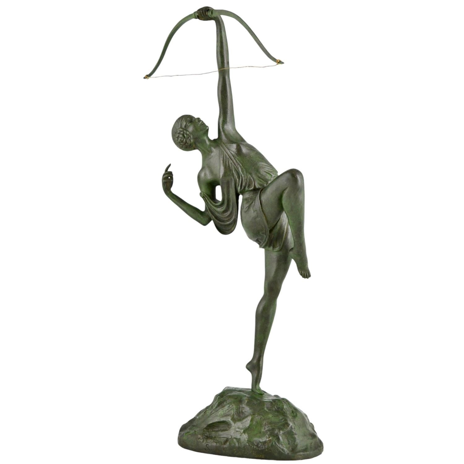 Art Deco bronze sculpture Diana with bow 33 cm by Pierre Le Faguays. 
Founders signature Susse Frères Editeurs Paris and foundry seal.
Green patina, France 1925.
There is a picture of this model on page 424 of
Bronzes, sculptors and founders by H.