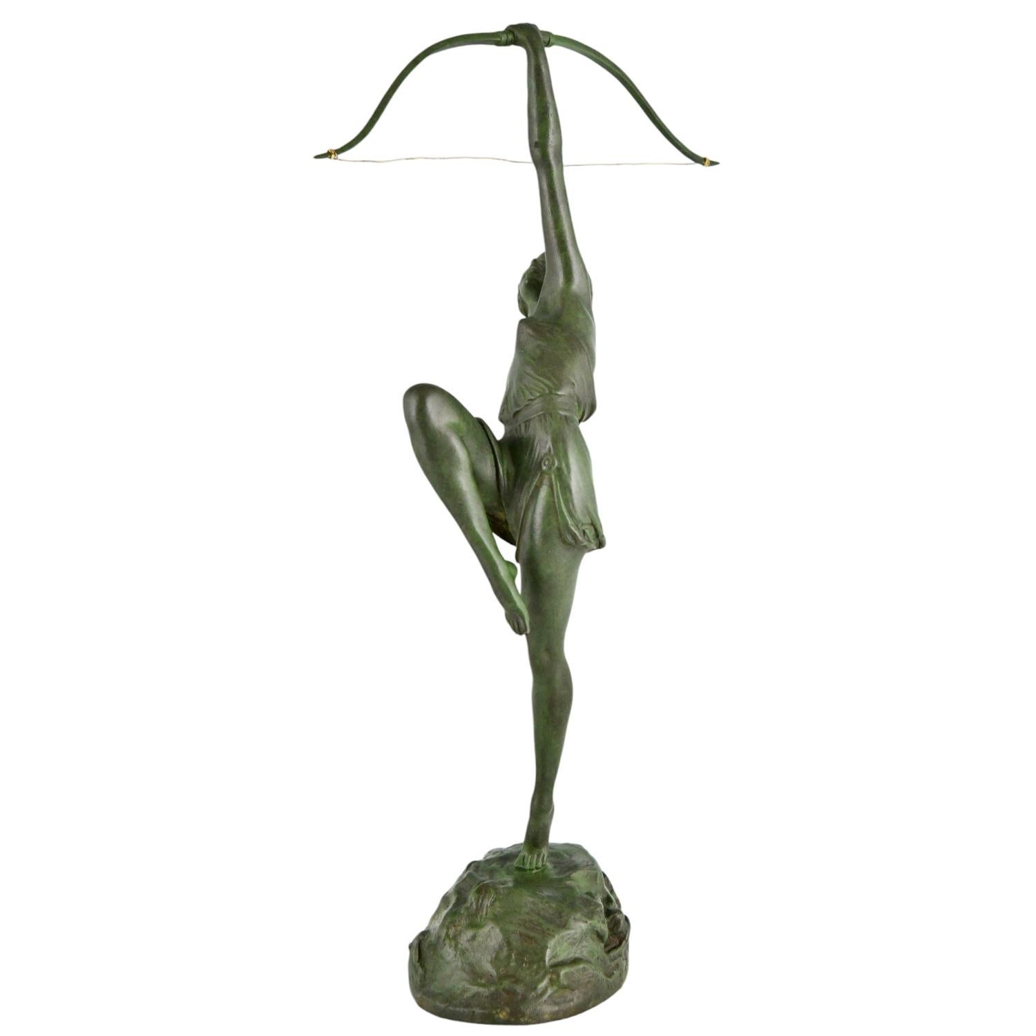 Patinated Art Deco bronze sculpture Diana with bow by Pierre Le Faguays & Susse Frères.