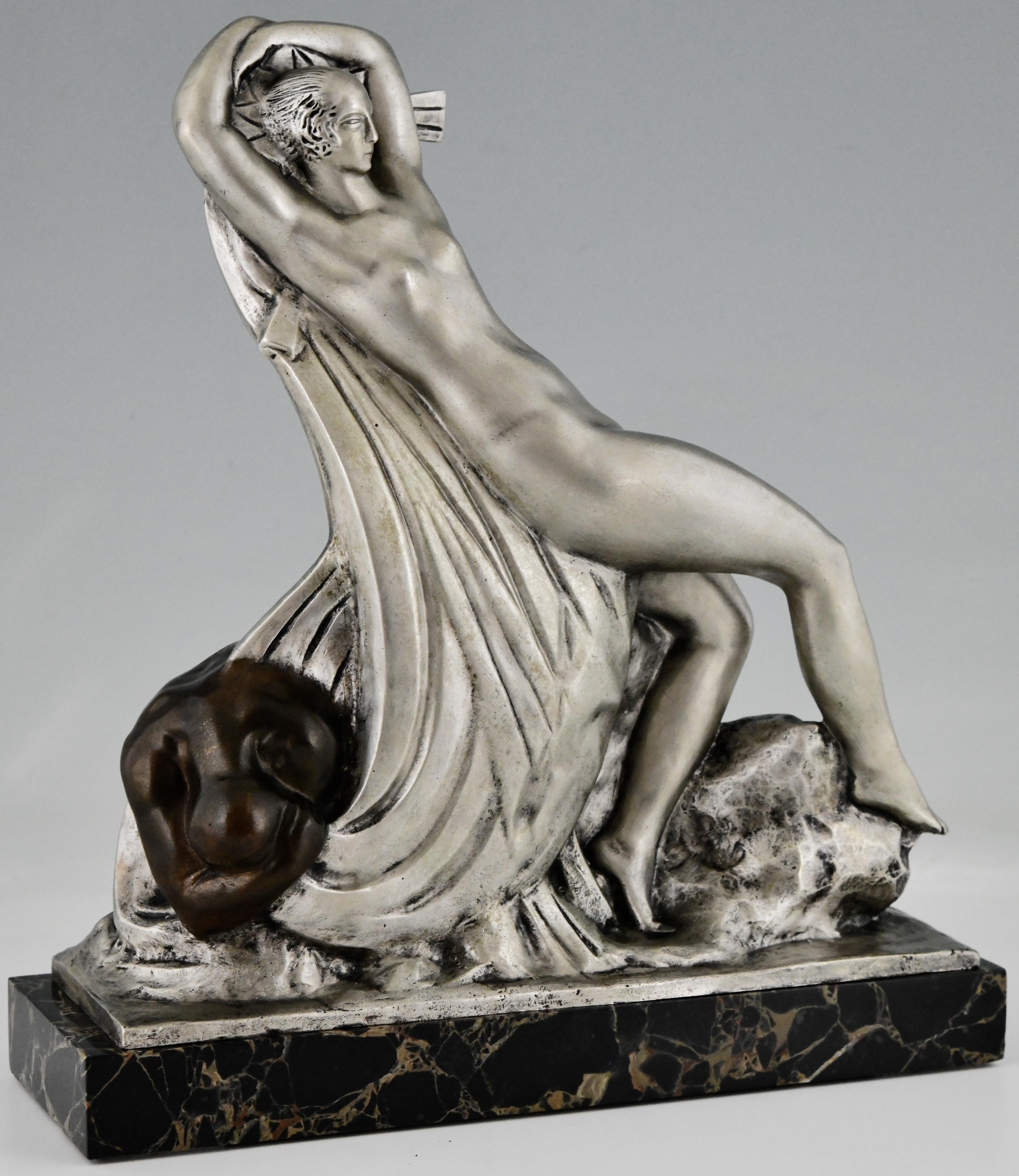 Art Deco bronze sculpture dancing nude and kneeling man by Raoul Lamourdedieu. 
Foundry Mark Alexis Rudier Fondeur Paris. Edition Pomone, the design studio lead by Paul Follot. 
Bronze with silver and brown patina on Portor marble base. 
France