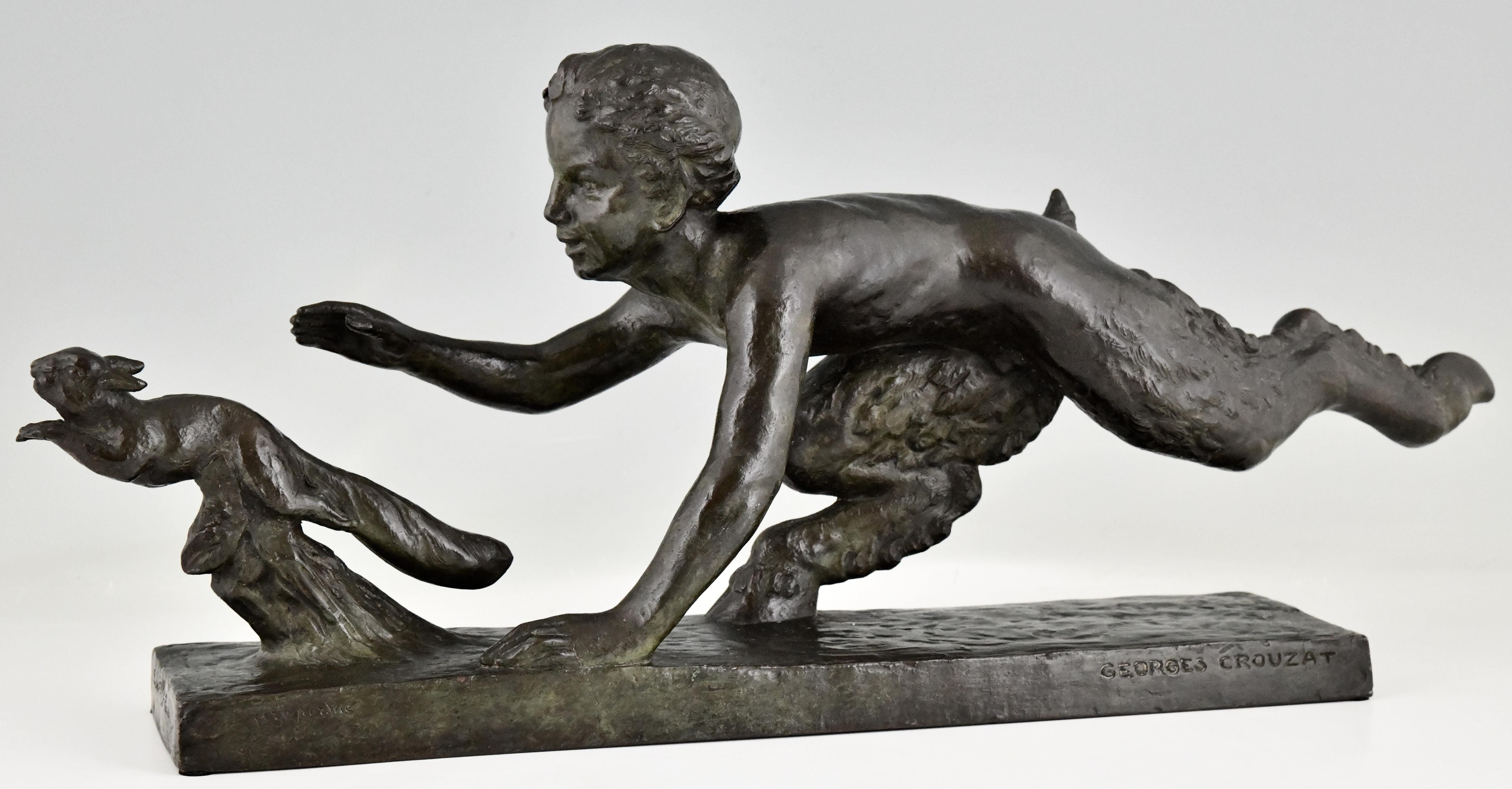 Art Deco bronze sculpture faun and squirrel, Faune à l’ecureuil by Georges Crouzat. 
With the foundry mark of Susse Frères and marked Cire perdue, lost wax technique. 
Bronze with beautiful green patina. France 1934. 
The same sculpture is in the