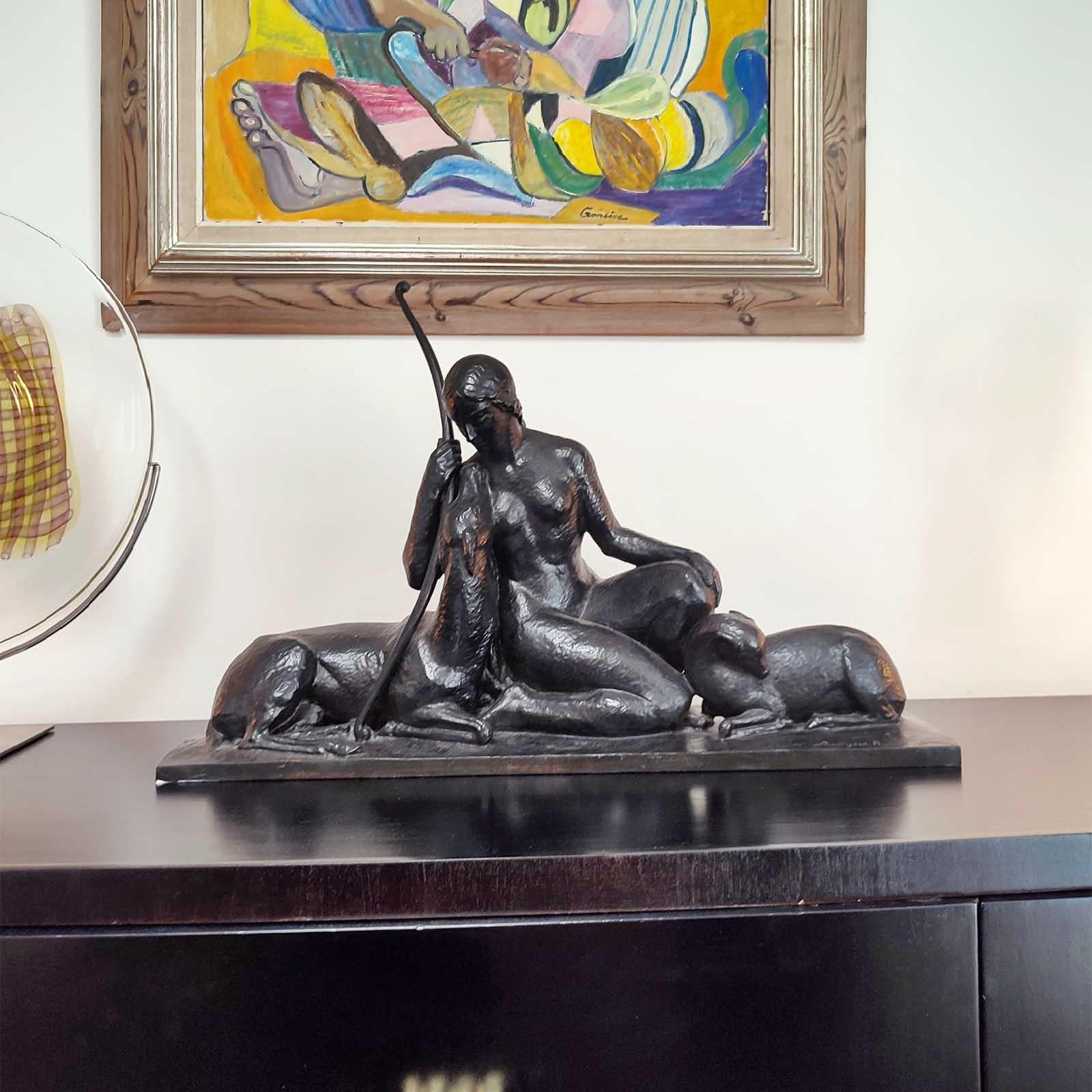 Art Deco Bronze Sculpture Goddess of the Hunt by Andre Lavaysse, Susse Freres.
A dark patinated bronze figural group representing Diane with deer and fawn by Andre Lavaysse.
Signed “Lavaysse A”, “cire perdue” (lost wax), “Susse Fres. Edts. Paris”,