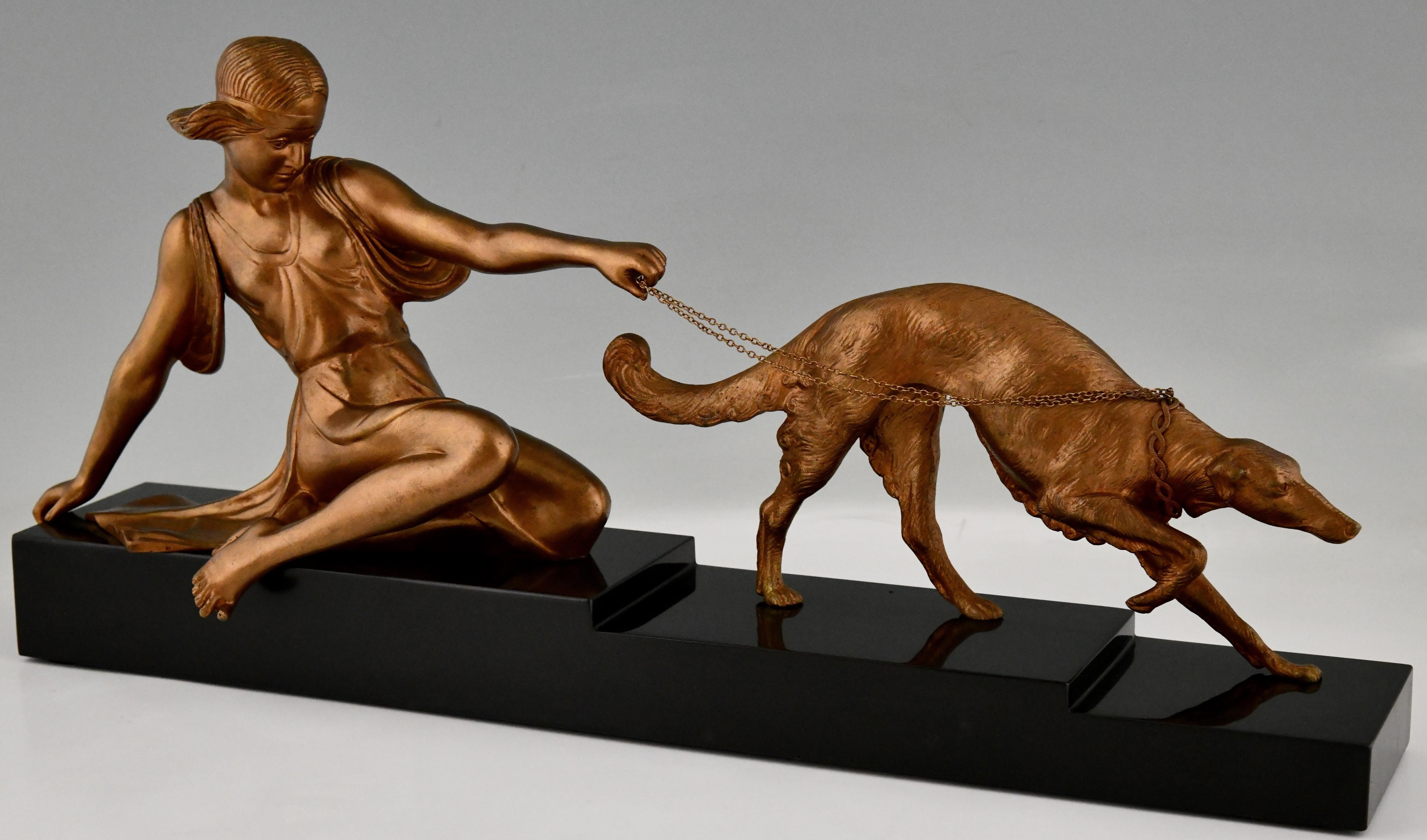 Art Deco bronze sculpture lady with greyhound dog signed by Armand Godard. 
Patinated bronze on Belgian Black marble base. France 1930.

Literature:
Art Deco sculpture by Victor Arwas, Academy.
Statuettes of the Art Deco period by Alberto Shayo.