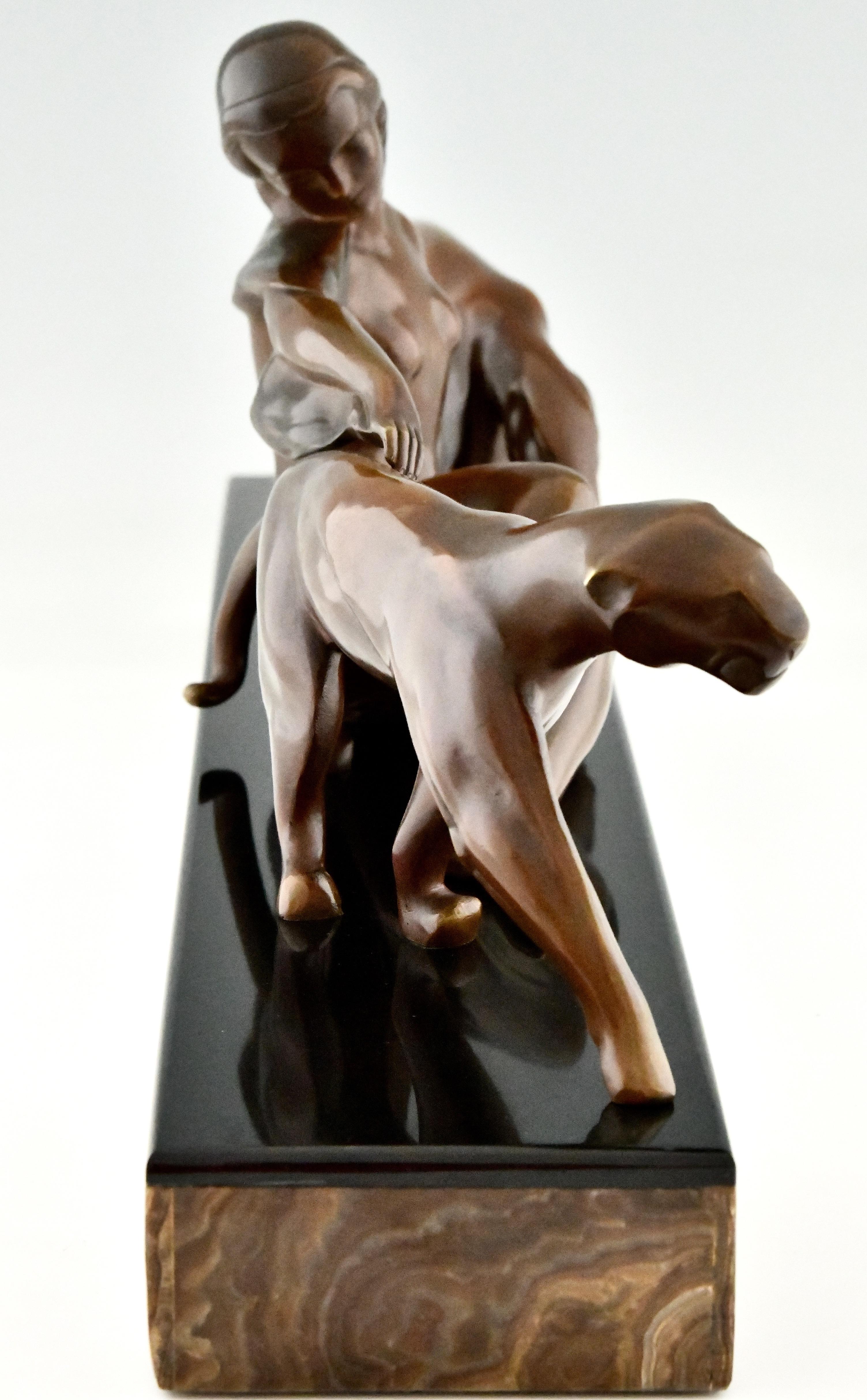 Patinated Art Deco Bronze Sculpture Lady with Two Panthers by Michel Decoux 1920