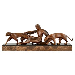 Art-déco-Bronze-Skulptur Dame mit zwei Panthern aus dem Art déco-Stil von Michel Decoux, 1920