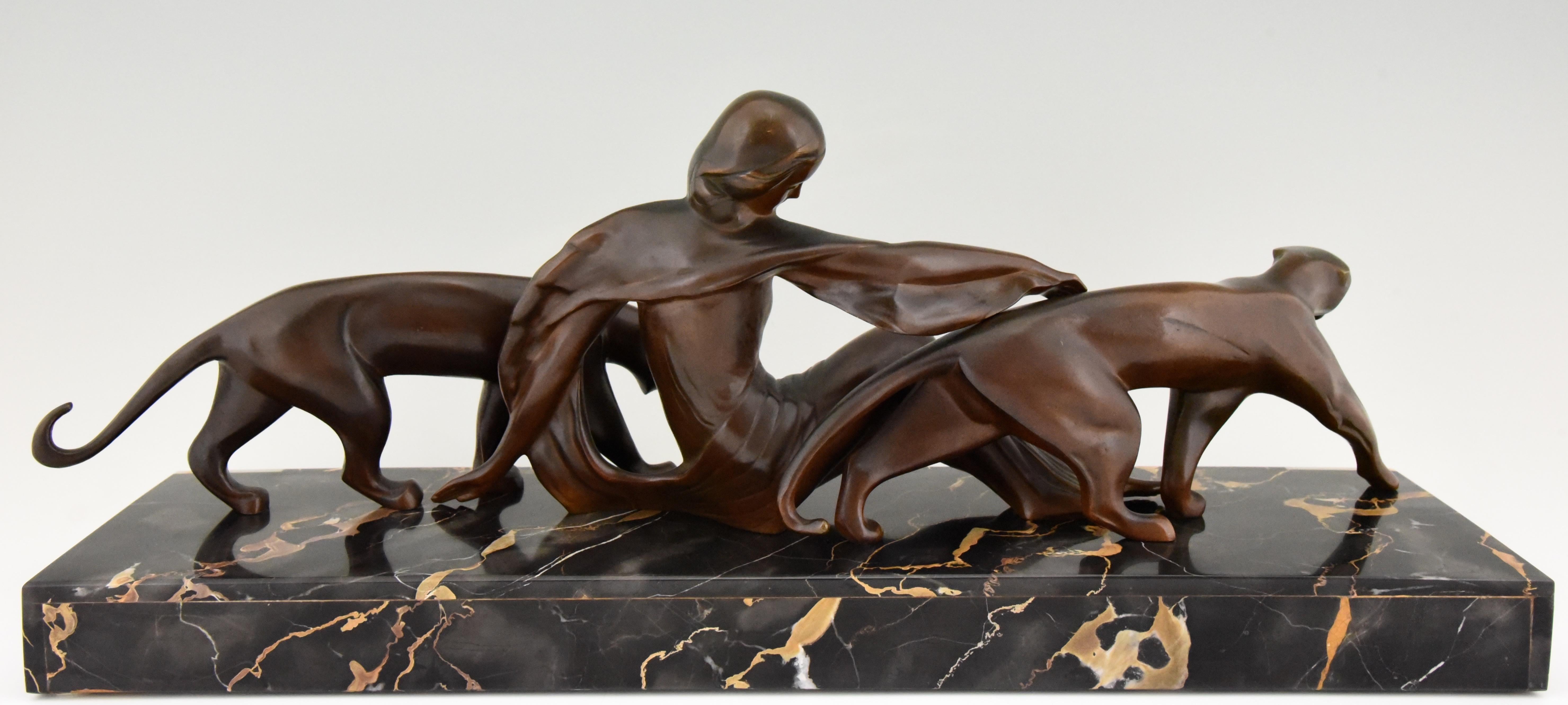 Patinated Art Deco Bronze Sculpture Lady with Two Panthers Michel Decoux, 1930