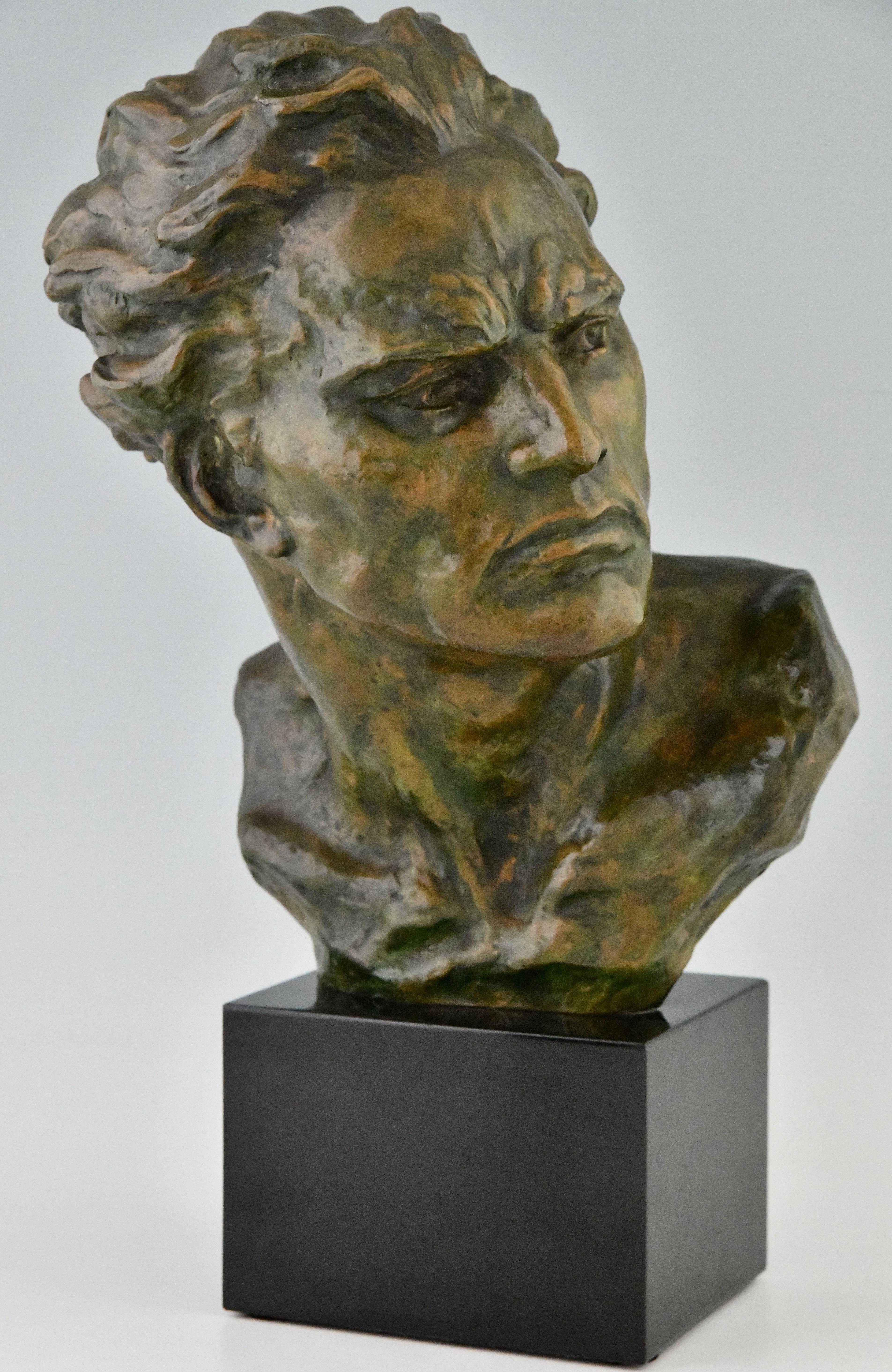 Art Deco bronze sculpture male bust by Ugo Cipriani.
Patinated bronze. 
Belgian black marble base. 
France 1930. 
Literatuur:
“Art Deco sculpture” Alastair Duncan.