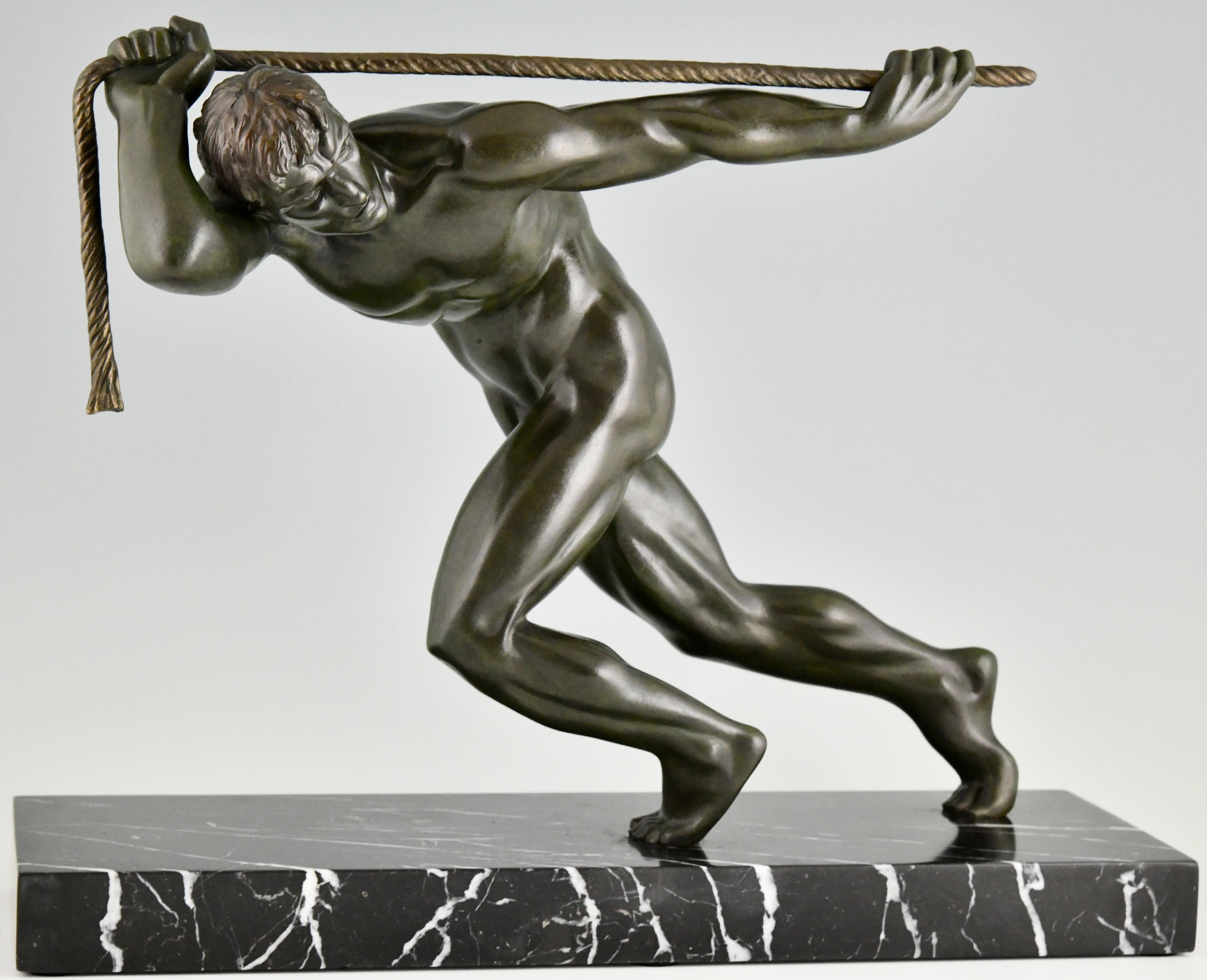
Art Deco bronze sculpture male nude athlete with rope by Guiraud Riviere. 
Patinated bronze on black marble base. 
France 1930.

Literature:
 “Art deco sculpture” by Victor Arwas, Academy. 
“Art deco and other figures” by Brian Catley, Antique