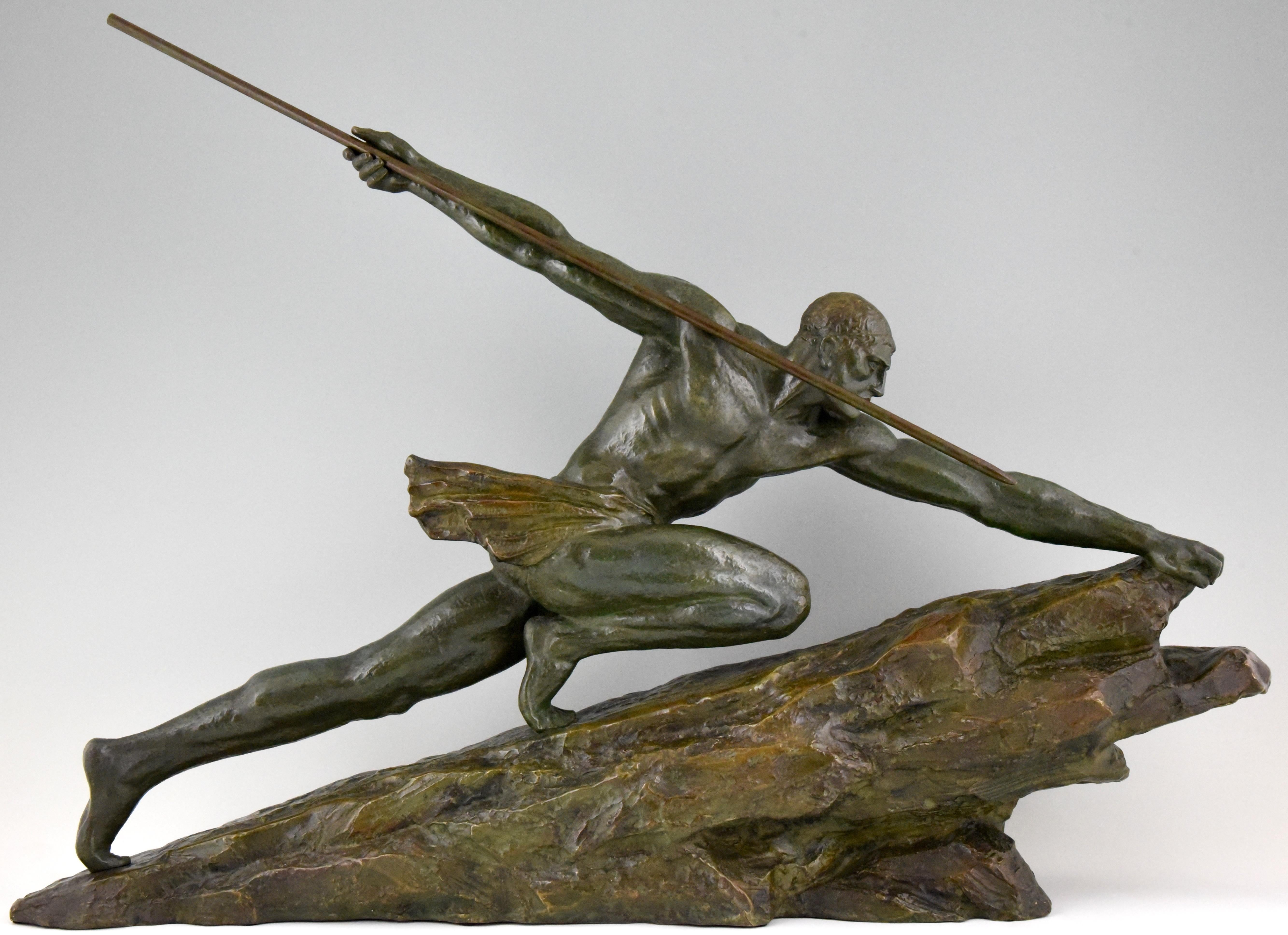 “One chance” Impressive Art Deco bronze sculpture of a man on a rock throwing a spear, signed P. Le Faguays, France, 1927. Lovely green patina.
This model is illustrated in the book 
?“Bronzes, sculptors and founders” H. Berman, Abage. ?Page 425