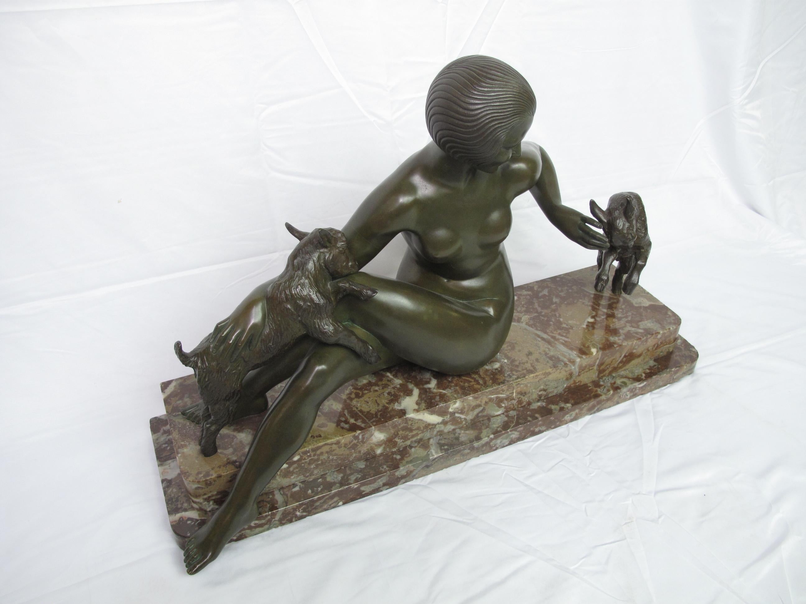 Art Deco bronze sculpture by Maurice Guiraud-Riviere (French, 1881-1947). A scarce untitled work often called woman with goats or 