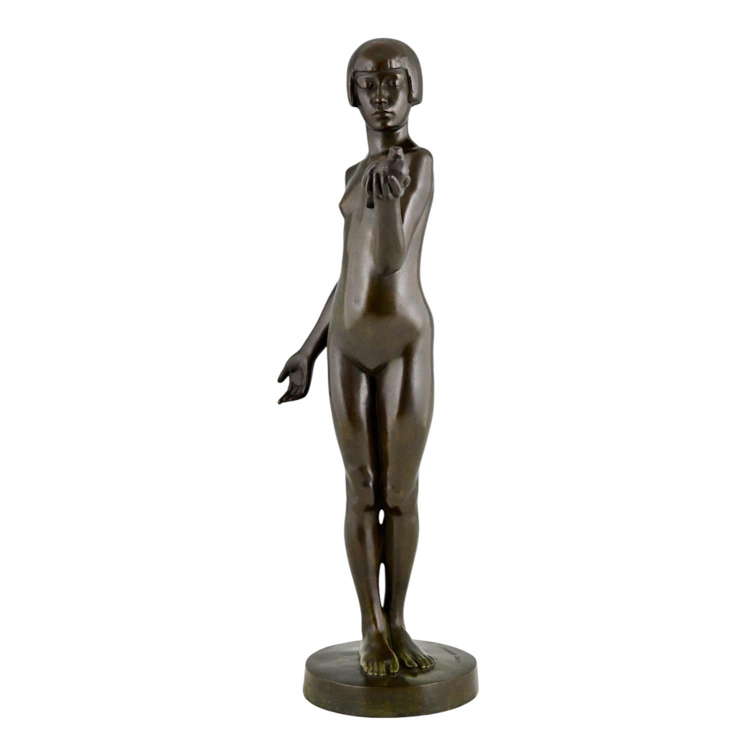 Escultura Art Decó de bronce chica desnuda con paloma de Henry Arnold Francia 1928. Francés en venta