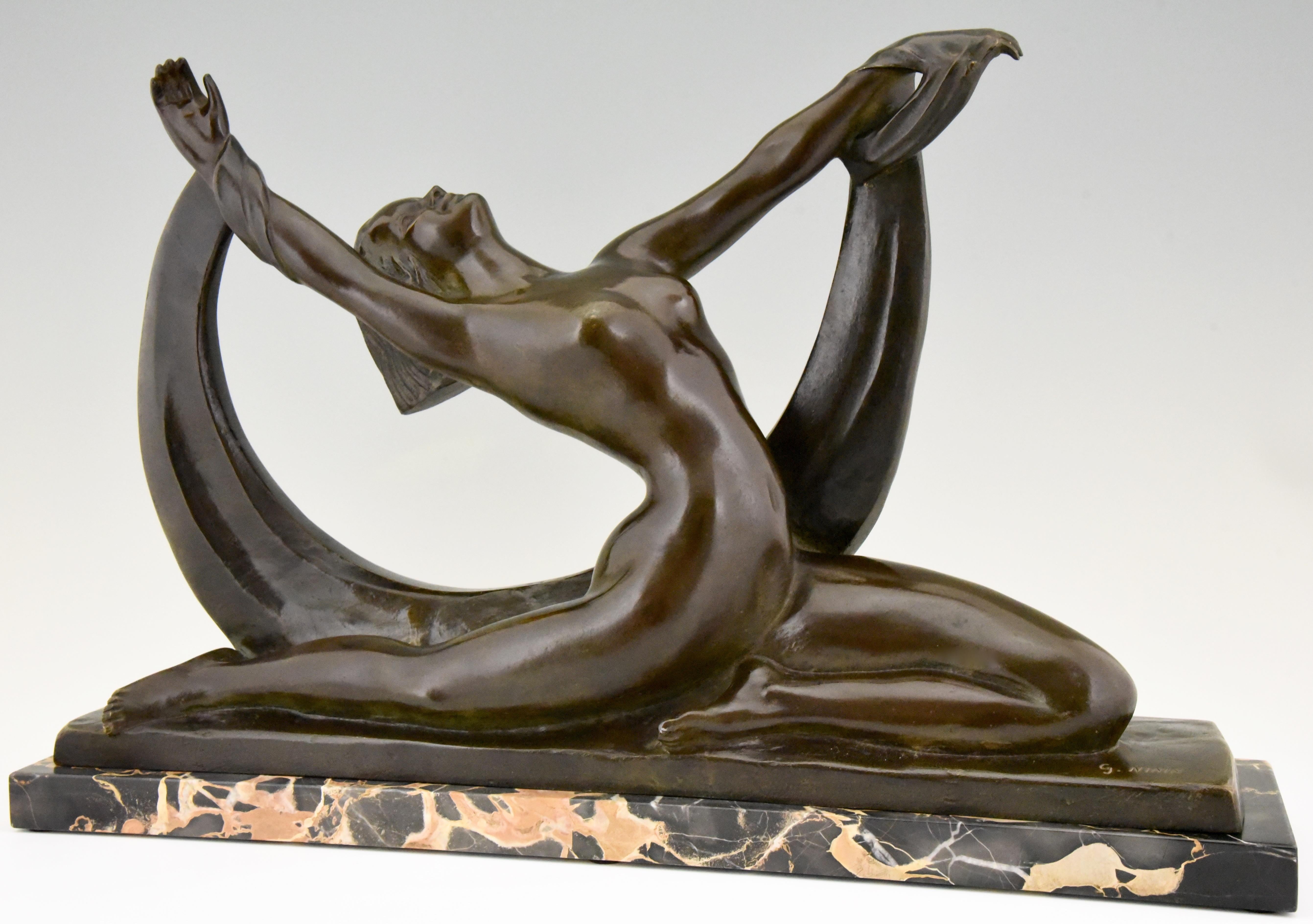 Impressive Art Deco bronze sculpture of a nude lady, scarf dancer in split pose signed by the French artist G. Ninin, circa 1925. The bronze has a beautiful patian and stands on a Portor marble base.
This sculpture is illustrated in: ?“Bronzes,