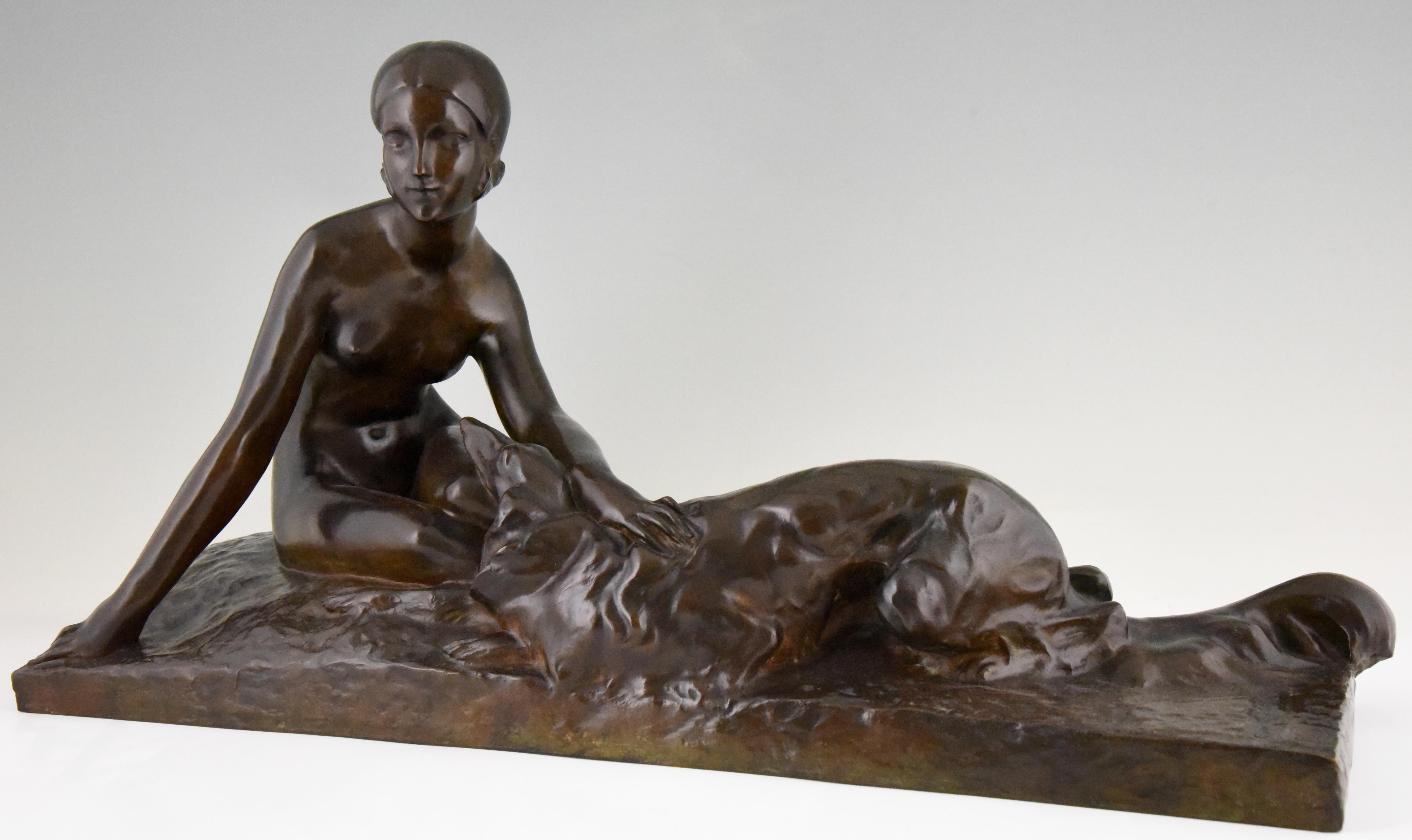 Impressive Art Deco bronze sculpture of a nude lady with her borzoi dog. The sculpture is signed Coste, marked with the Susse Freres Foundry seal. Cast in the lost wax technique Cire perdue. Beautiful rich brown patina, France, 1930. 

Georges
