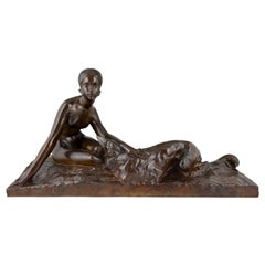 Sculpture en bronze Art déco d'un nu avec un chien Borzoi de Georges Coste France, 1930