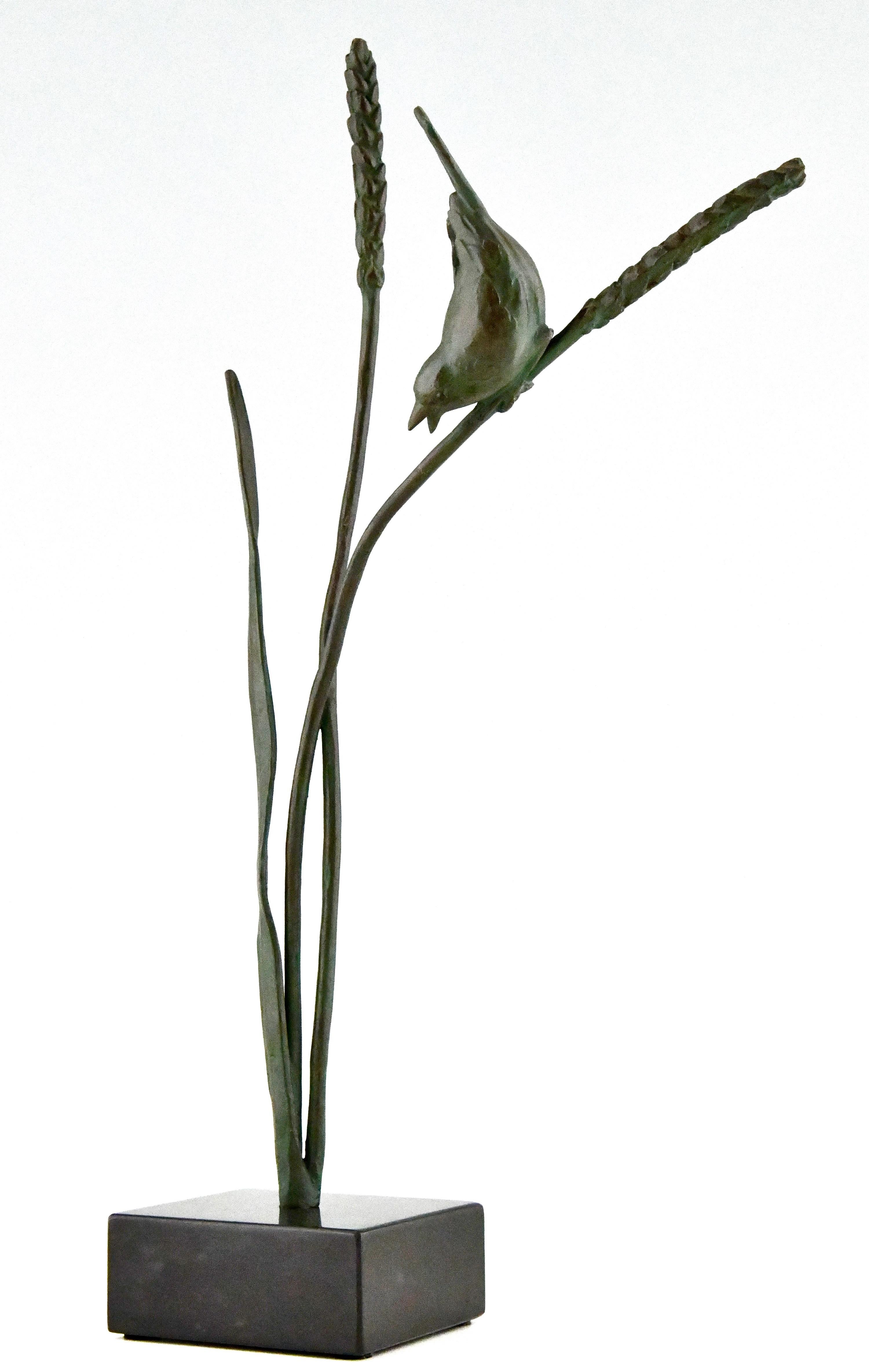 Art Deco bronze sculpture of a bird on a wheat stalk signed by the French artist Chatill.
France 1930. 
Marked bronze.
The sculpture has a green patina and is mounted on a Belgian Black marble base.