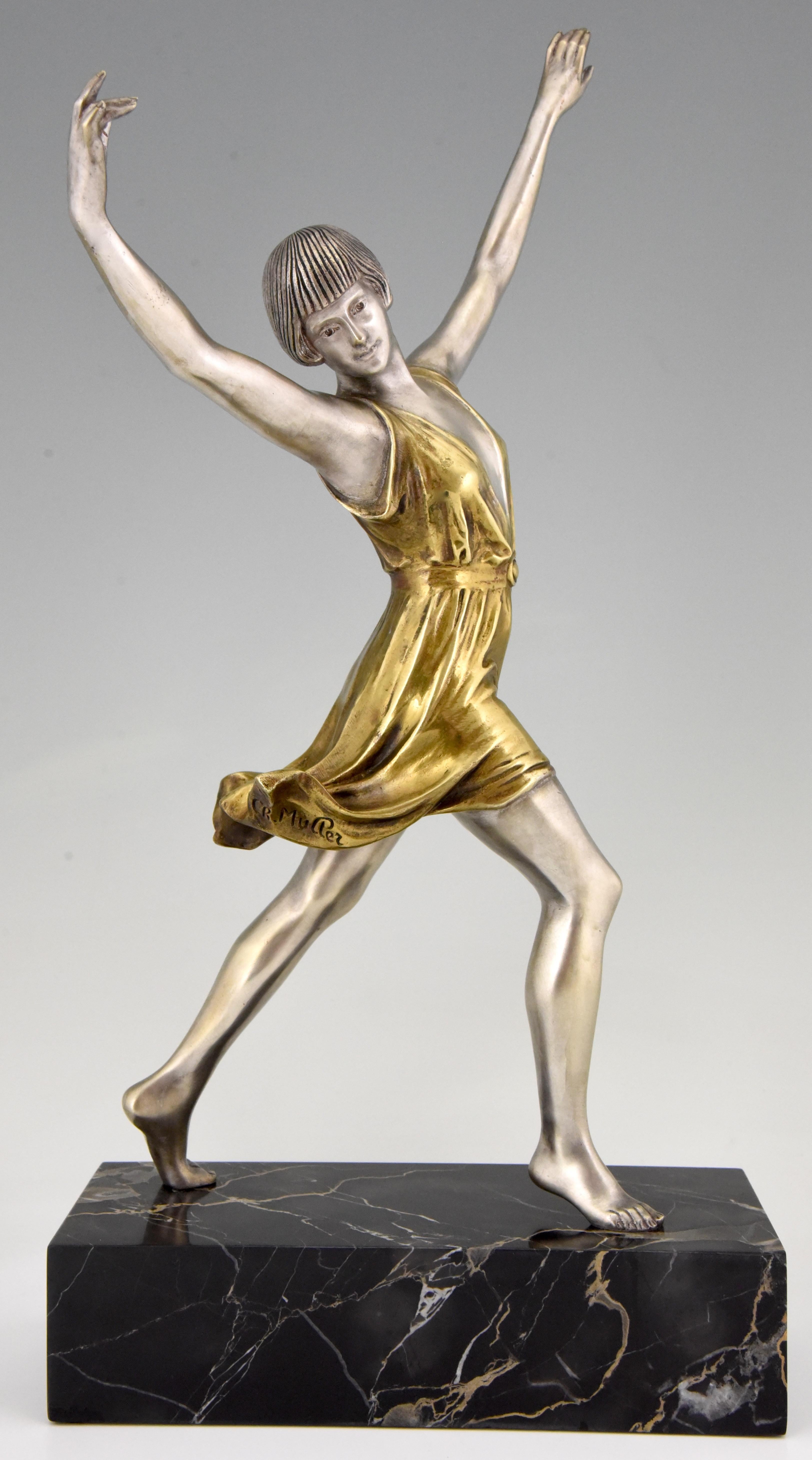 Art Deco bronze sculpture of a dancing woman signed by Charles Müller. The bronze has a lovely silver and gold patina and stands on a black marble base, France, circa 1925. 

Literature:
“Statuettes of the Art Deco period” Alberto Shayo.?“Art