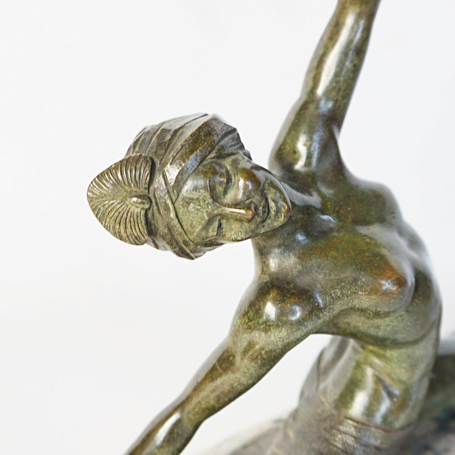 An Art Deco cold painted bronze sculpture by JP Morante. The elegant dancer in an extravagant pose with arms outstretched. Signed 'Morante' to sole of foot. Set over a variegated marble base. 

Dimensions: H 27cm, W 40cm, D 8cm 

Origin: