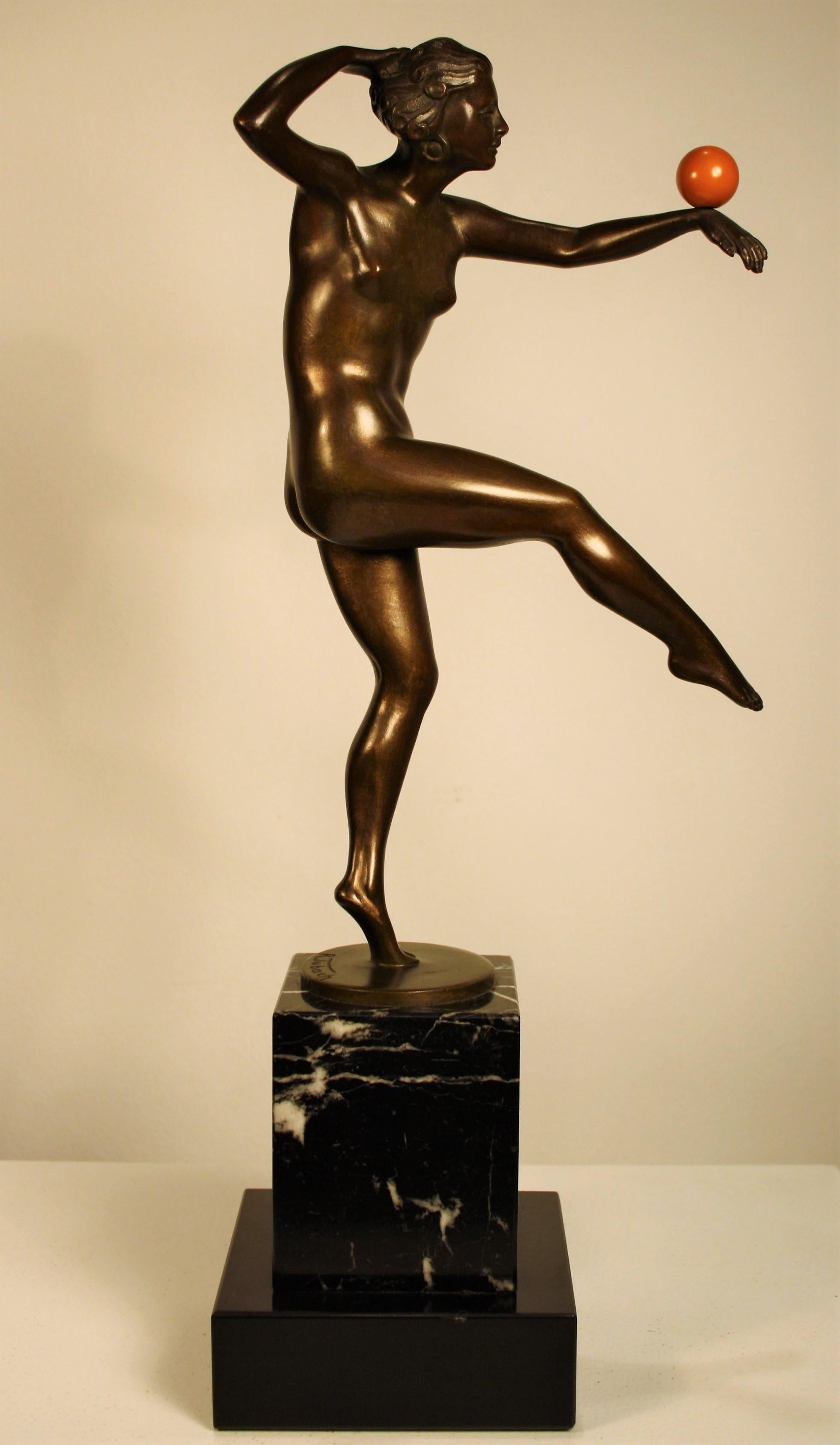 Beautiful Art Deco bronze sculpture of a nude dancer on a marble base. 
Signed by the artist R.Tubach, and also marked with the name of the editor (A.Vanderlinden)