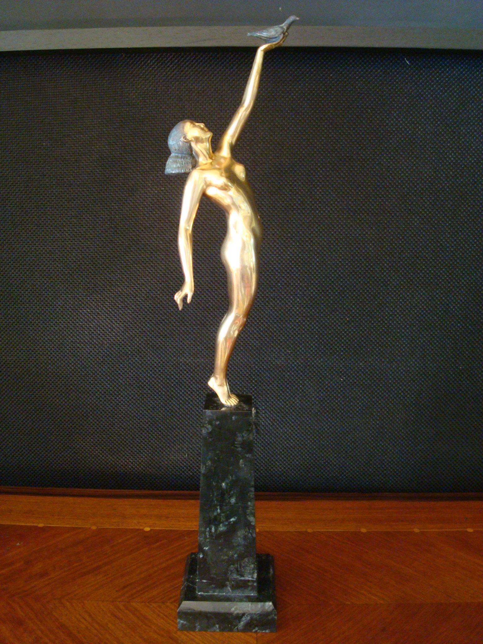 Gilt Art Deco Bronze Sculpture of a Nude Figure Holding a Dove by Pierre Le Faguays