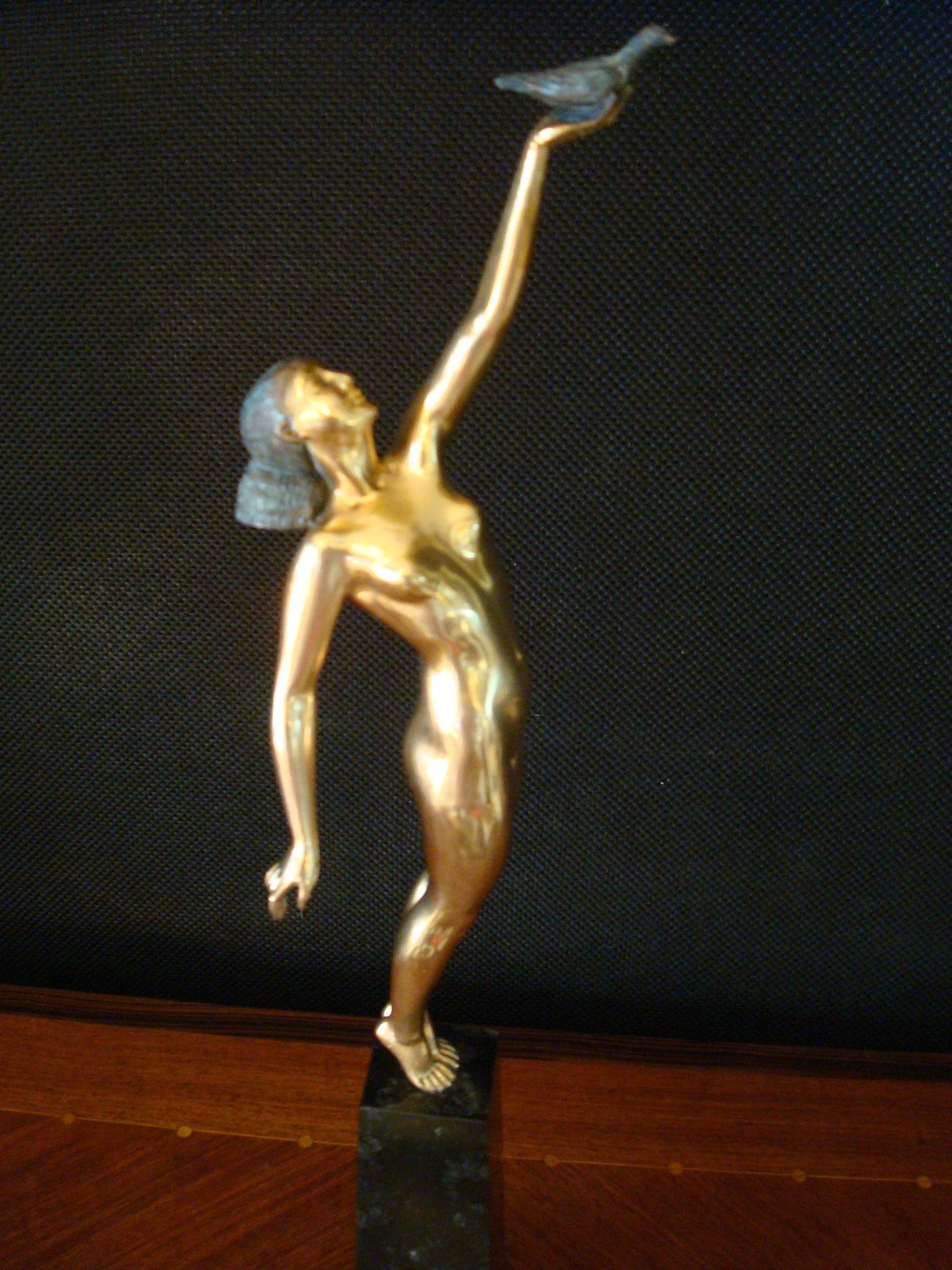 20th Century Art Deco Bronze Sculpture of a Nude Figure Holding a Dove by Pierre Le Faguays