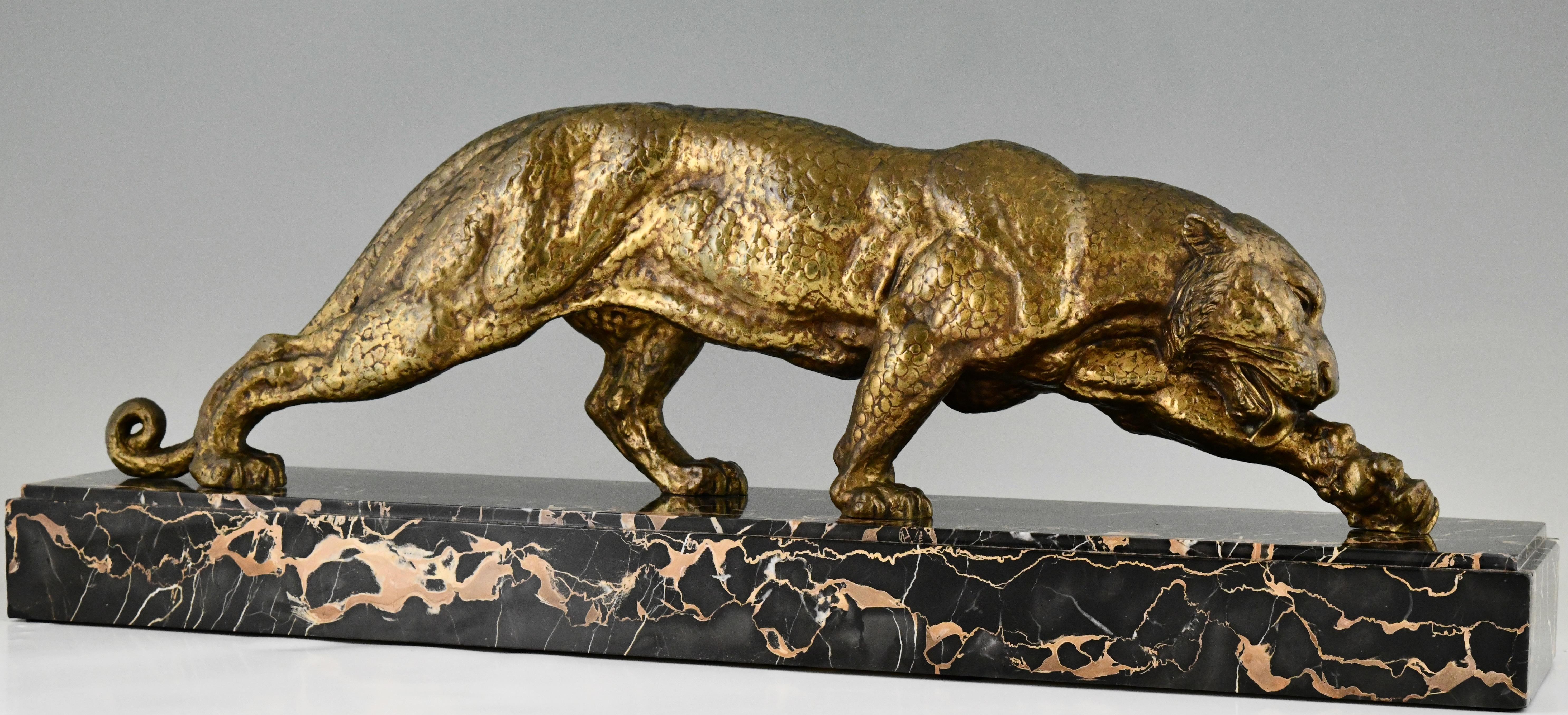 Art Deco bronze sculpture of a panther by Demetre Chiparus. 
Patinated bronze sculpture on a Portor marble base. 
Signed and with founders signature
Editions Reveyrolis Paris, marked bronze veritable. 
France 1930. 
This sculpture is illustrated in