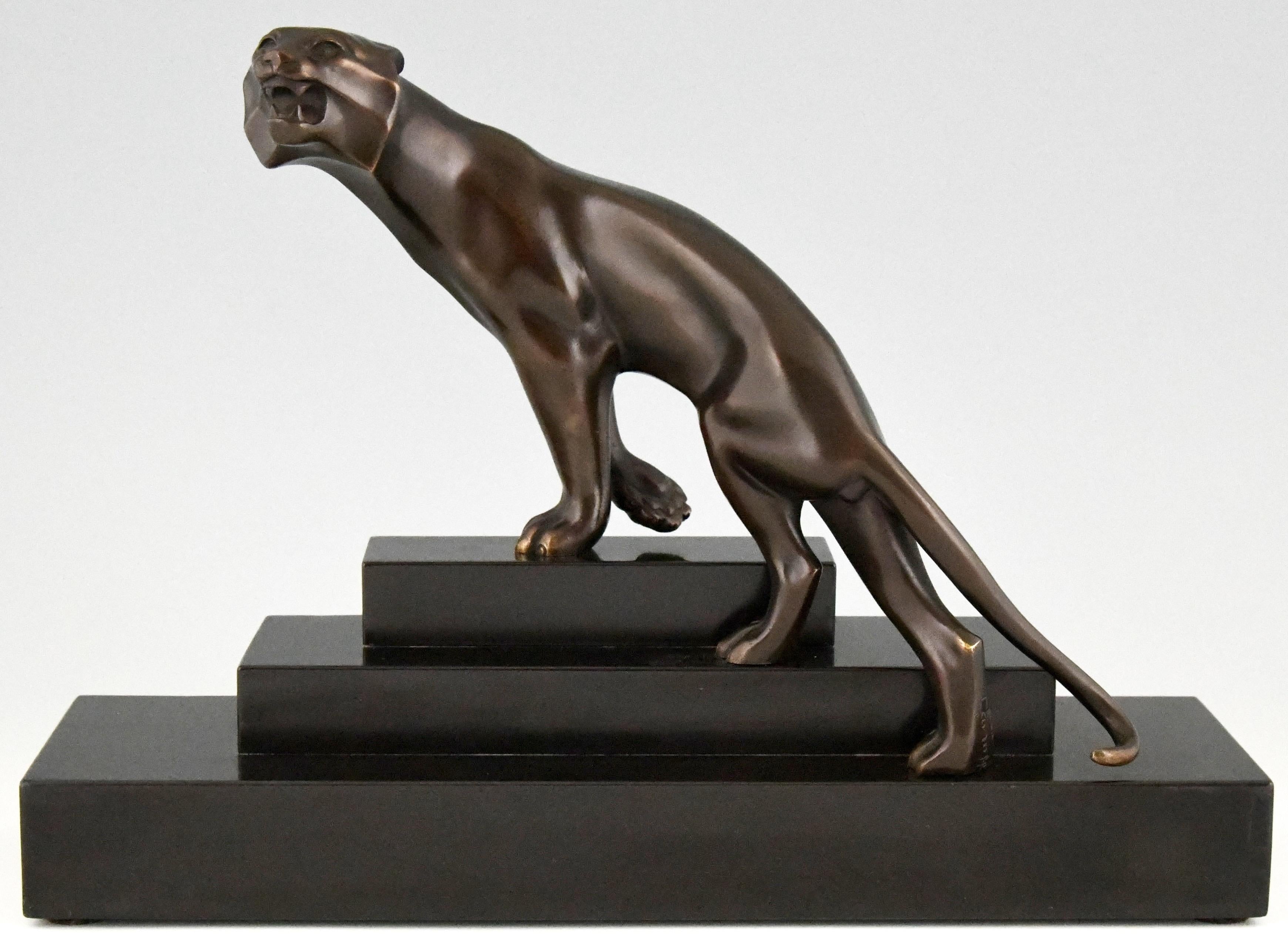 Art Deco bronze sculpture of a panther by Georges Lavroff on a stepped Belgian Black marble base. France 1925. The artist was born in Russia in 1895, he lived and worked in France. Work in Musea and private collections. 
 
This panther is