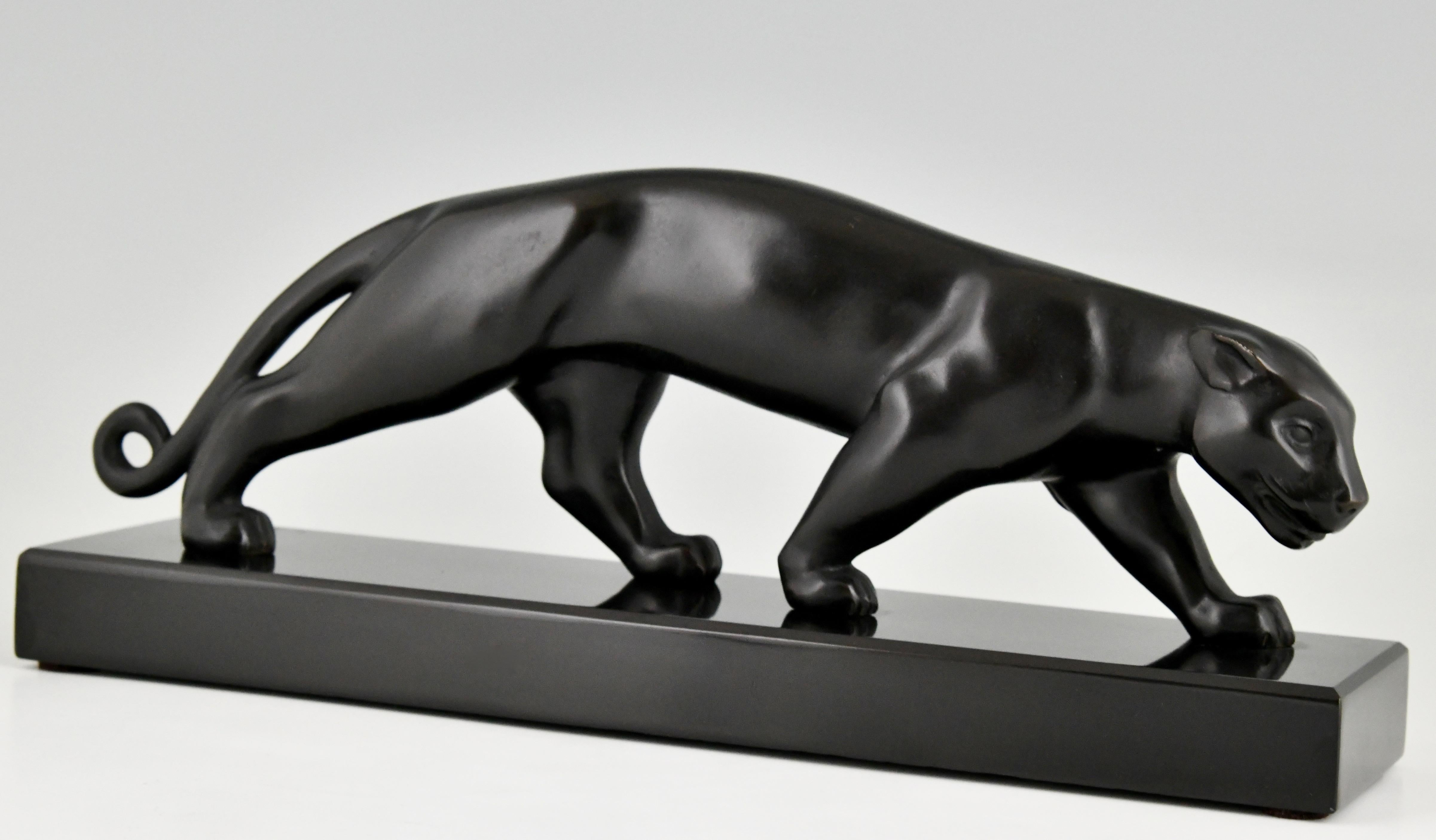 Stylish Art Deco bronze sculpture of a panther signed by the French artist Lucien Alliot, ca. 1925.
Bronze with black patina, on a Belgian Black marble base. 

“The dictionary of sculptors in bronze” by James Mackay. ?Antique collectors
