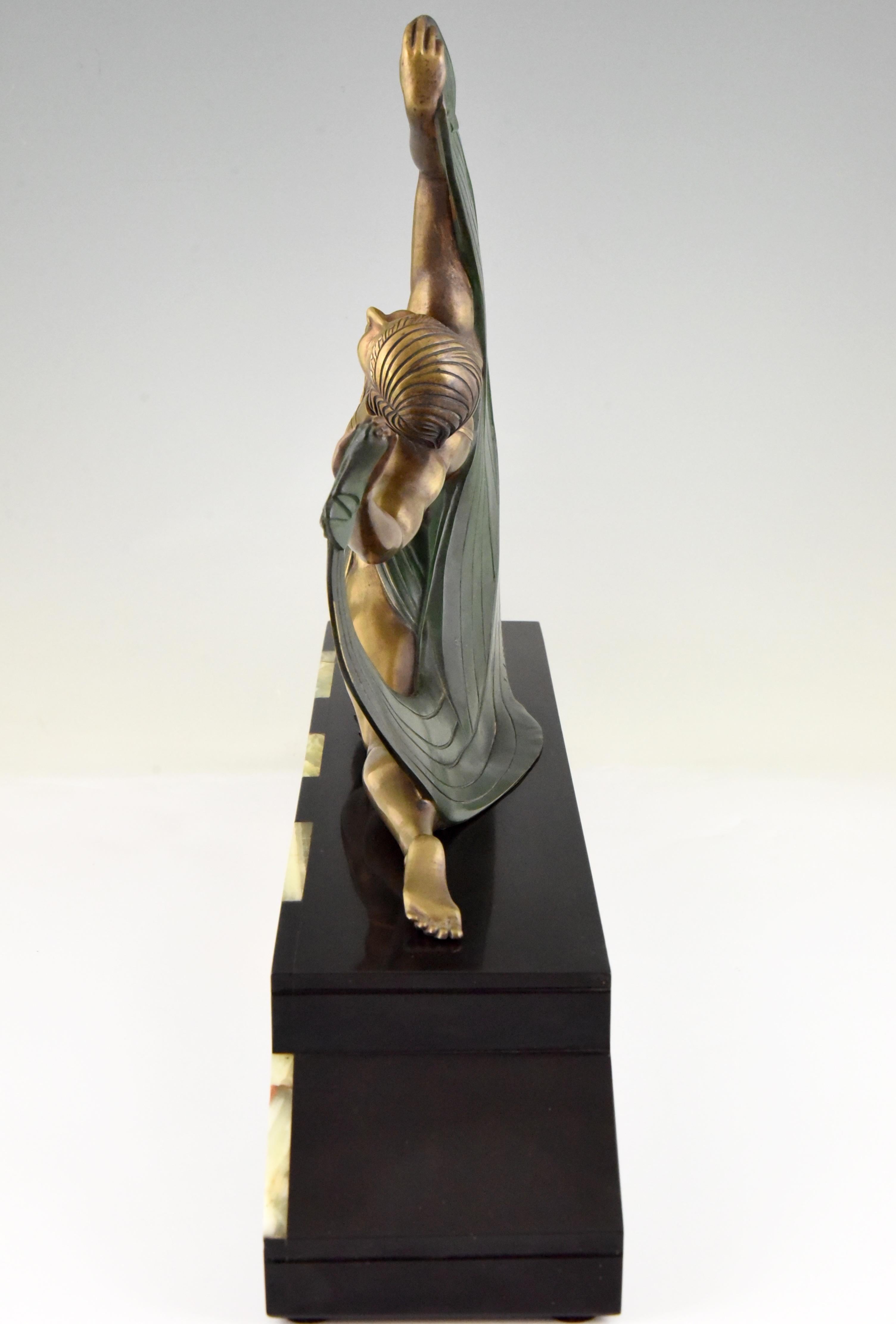 Patinated Art Deco Bronze Sculpture of a Scarf Dancer on Sunburst Base Jean Lormier, 1925