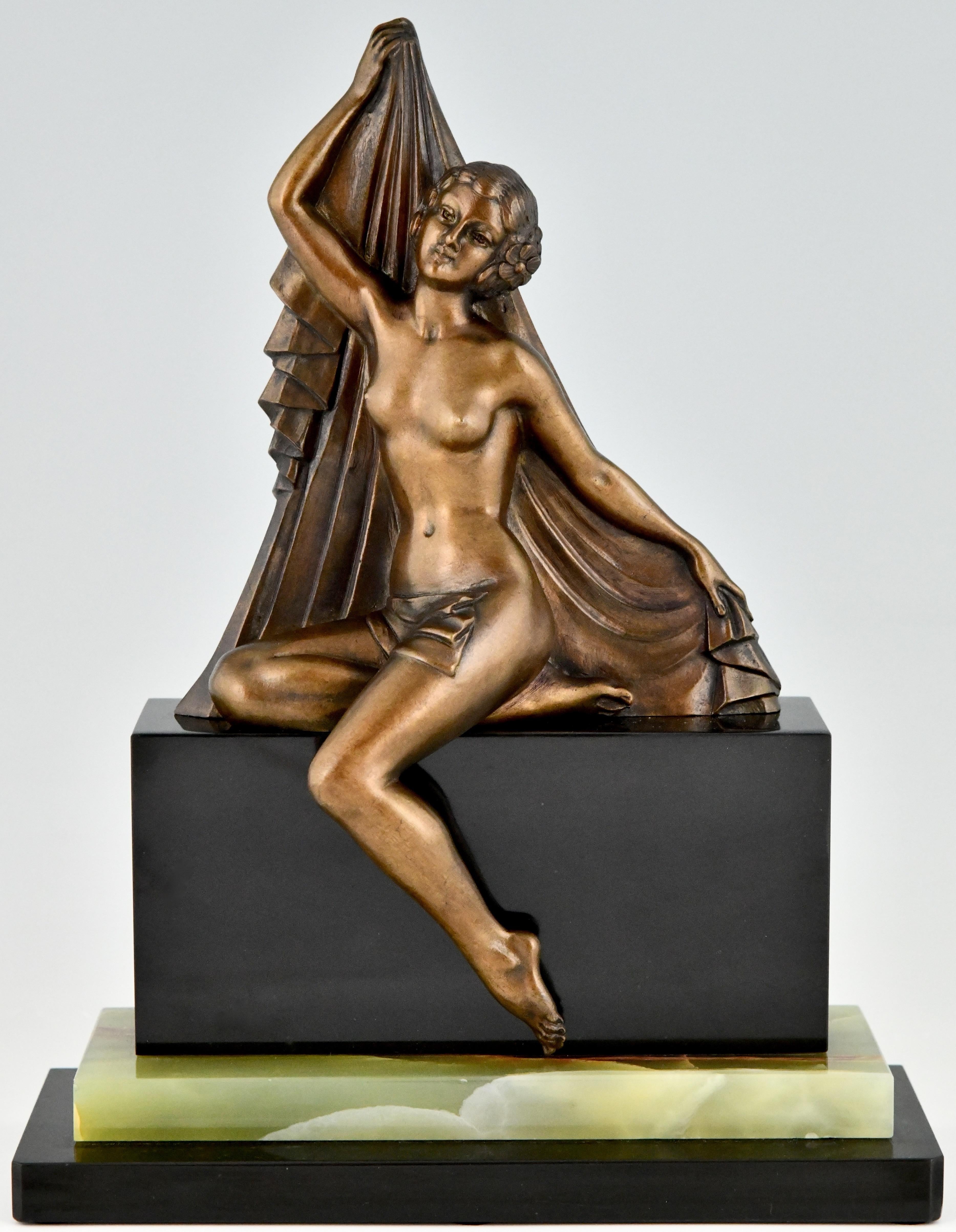 Art Deco bronze sculpture of a seated nude with drape by H. Molins. With founders' signature Patrouilleau. The bronze sculpture has a lovely patina and stands on a Belgian black and onyx base. France 1925.
