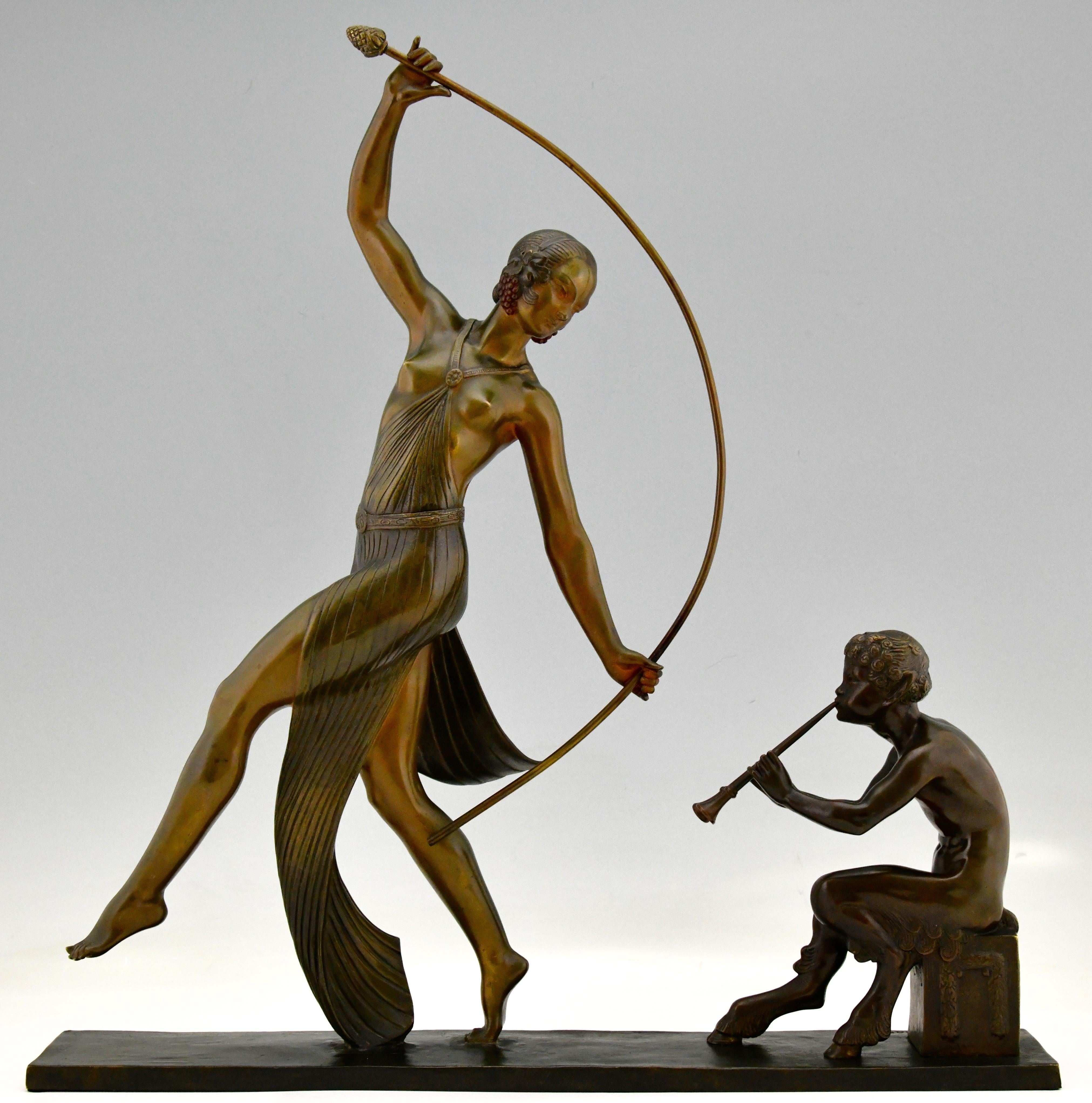 Art Deco bronze sculpture of a Thyrse dancer with faun playing flute signed by JD Guirande, pseudonym of Joe Descomps. Patinated bronze. France 1930.