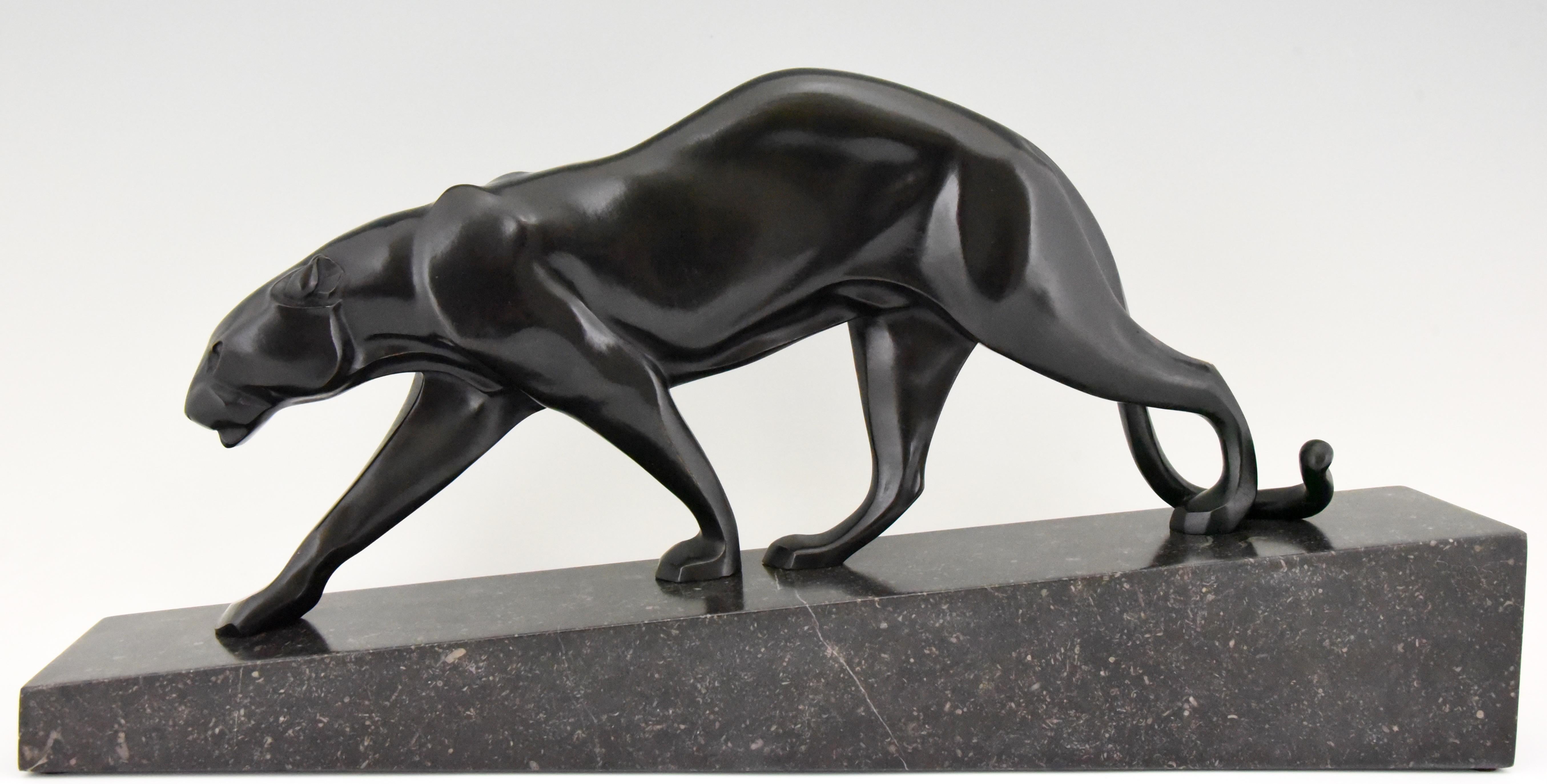 Impressive Art Deco bronze sculpture of a walking panther by the famous French sculptor Maurice Prost. The bronze has a beautiful black patina and stands on a black marble base with grey veins and specks
The sculpture has the founders' signature of