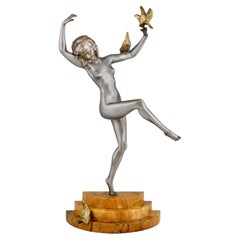 Escultura Art Decó de bronce de desnudo bailando con pájaros de Marcel Bouraine 1930