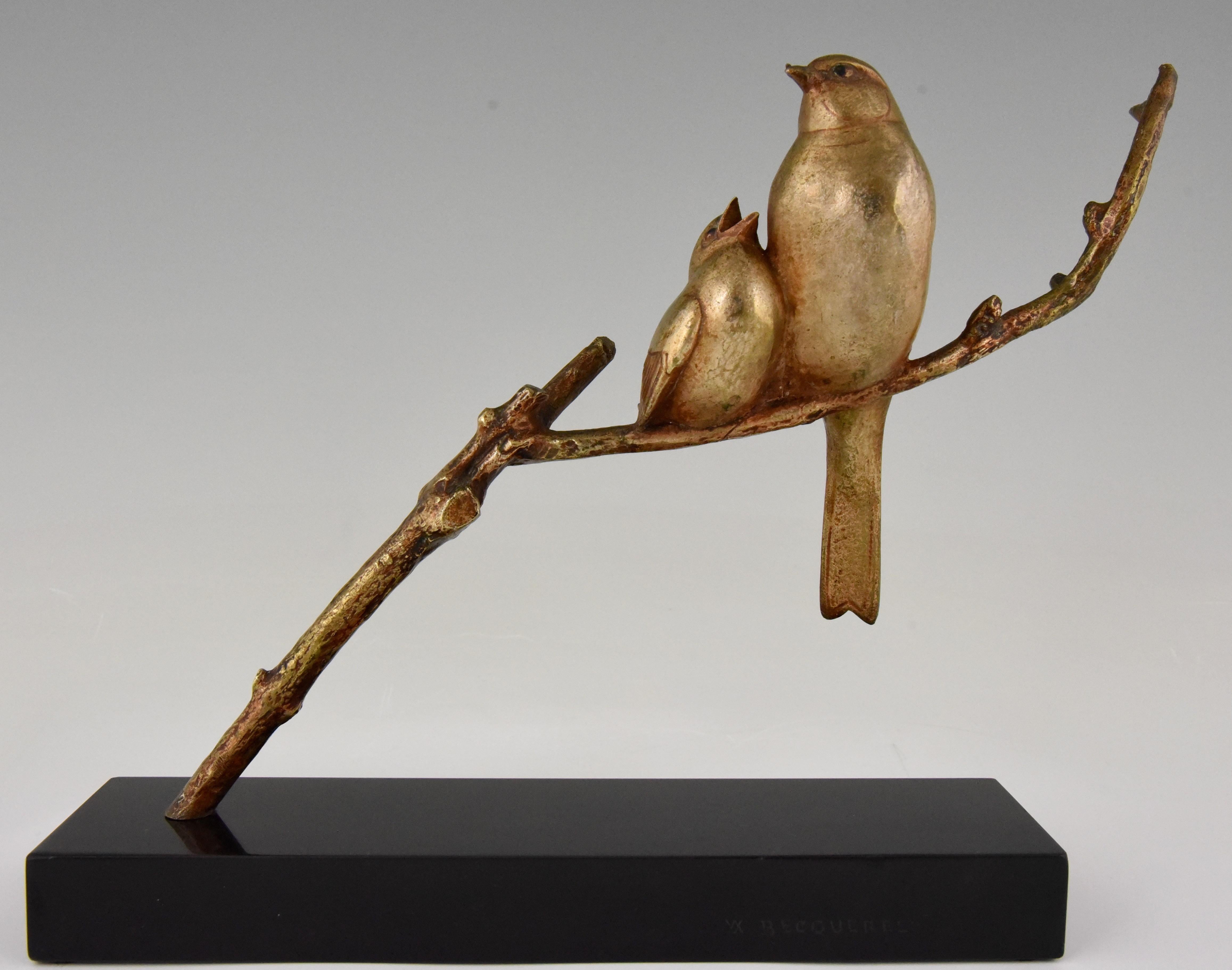 Very cute Art Deco bronze sculpture of a mother bird feeding her young.
Both birds are sitting on a branch. The bronze has a lovely original patina and stands on a Belgian Black marble plinth. Signed by the famous artist Andre Vincent Becquerel,