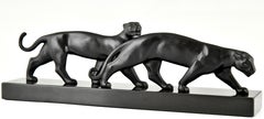 Scultura in bronzo Art Deco di due pantere Lucien Alliot Francia 1930