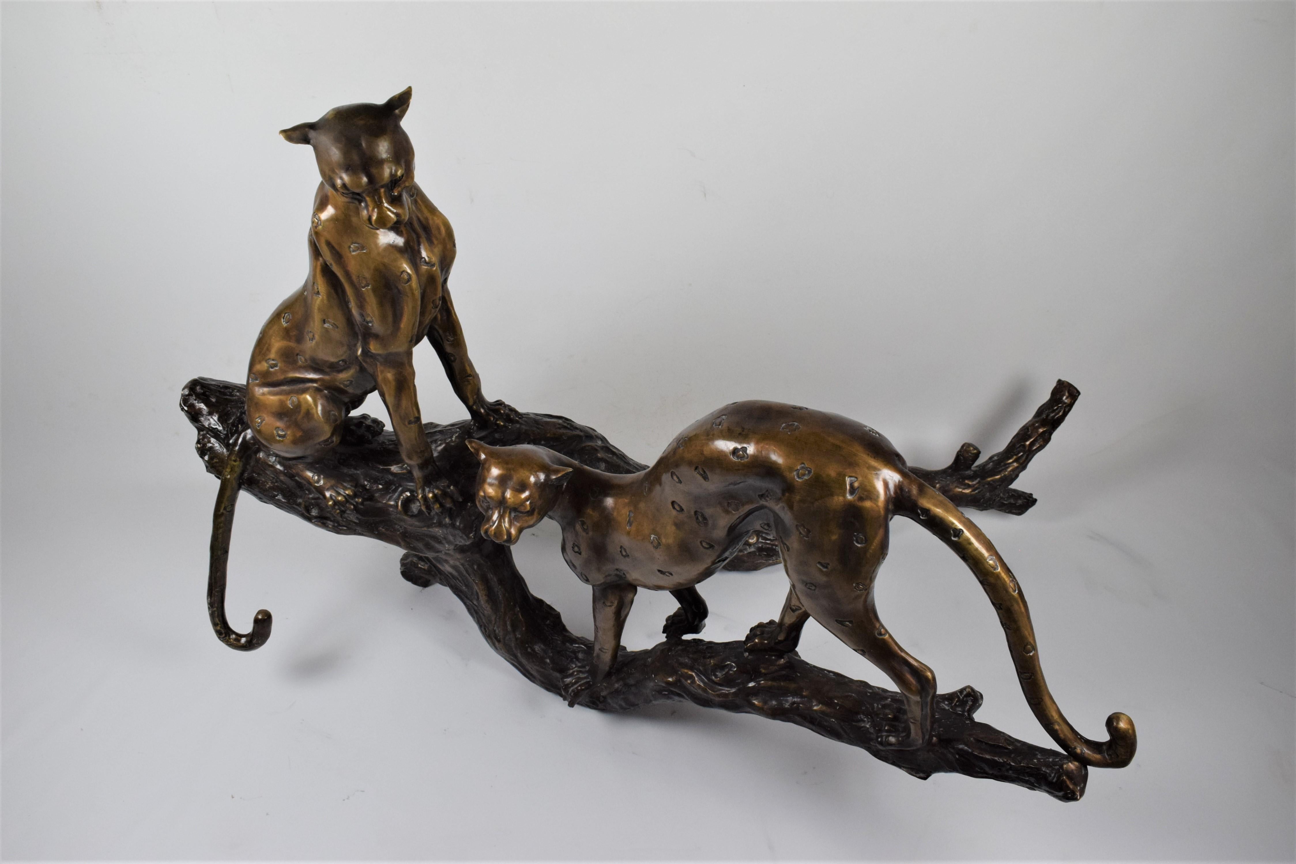 French Art Deco Bronze Sculpture of Two Resting Cheetah's on a Trunk For Sale