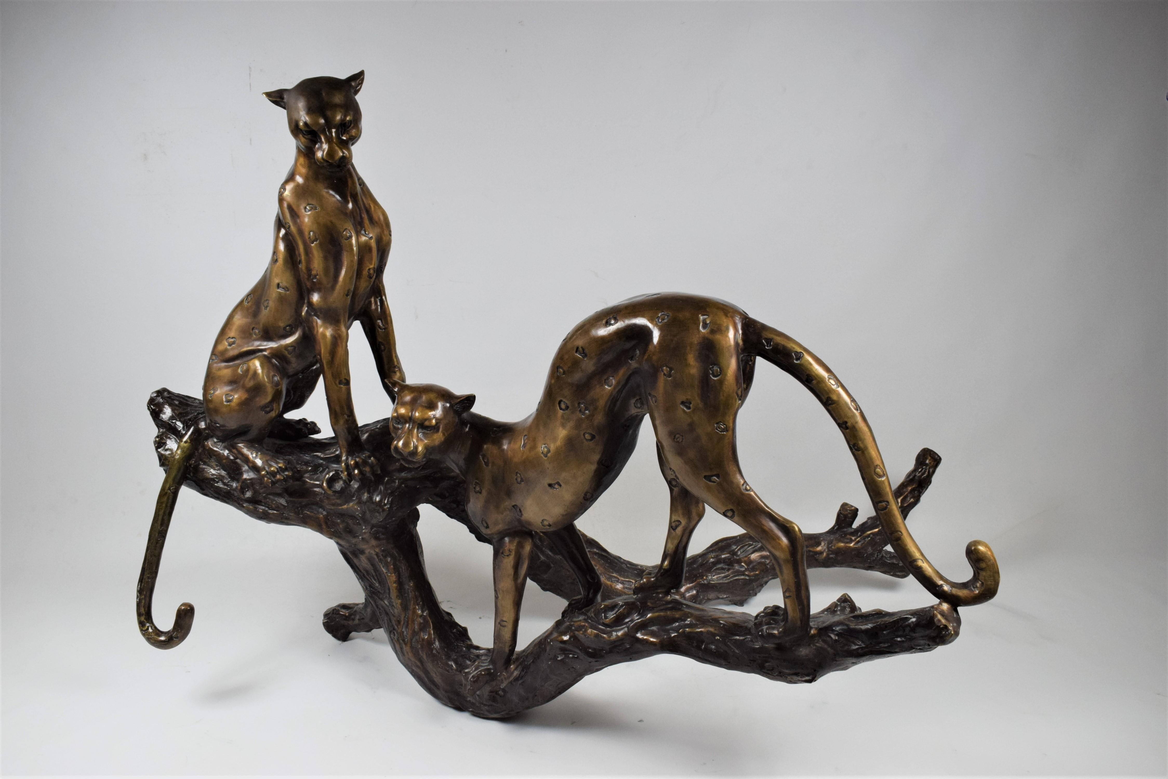 20th Century Art Deco Bronze Sculpture of Two Resting Cheetah's on a Trunk For Sale