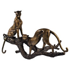 Art Deco Bronze Sculpture of Two Resting Cheetah's on a Trunk