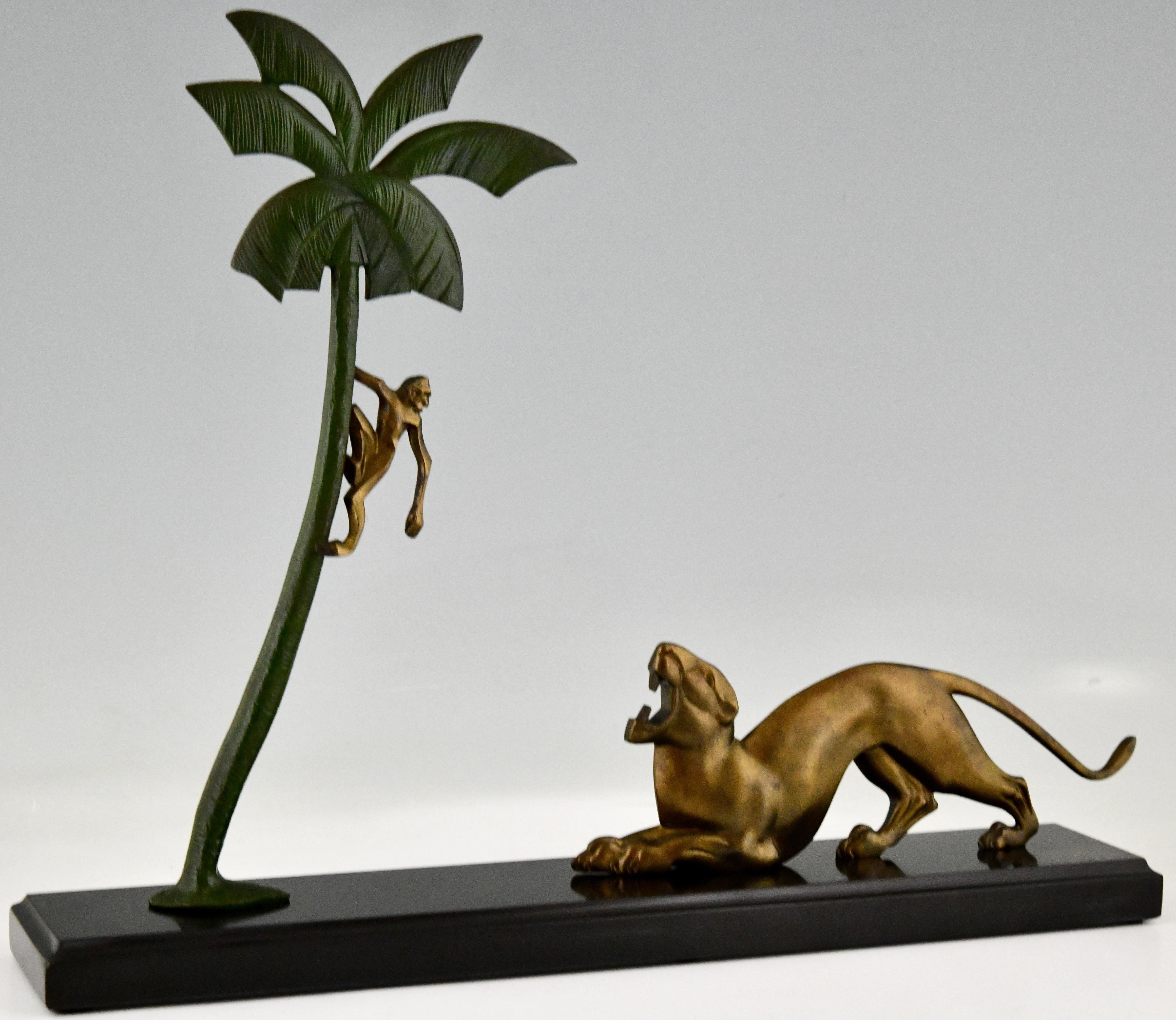 Art Deco bronze sculpture panther and monkey in palmtree by P. Berjean. Patinated bronze on a Belgian Black marble base. France 1930.

This sculpture is illustrated in: Statuettes of the Art Deco period, Alberto Shayo.